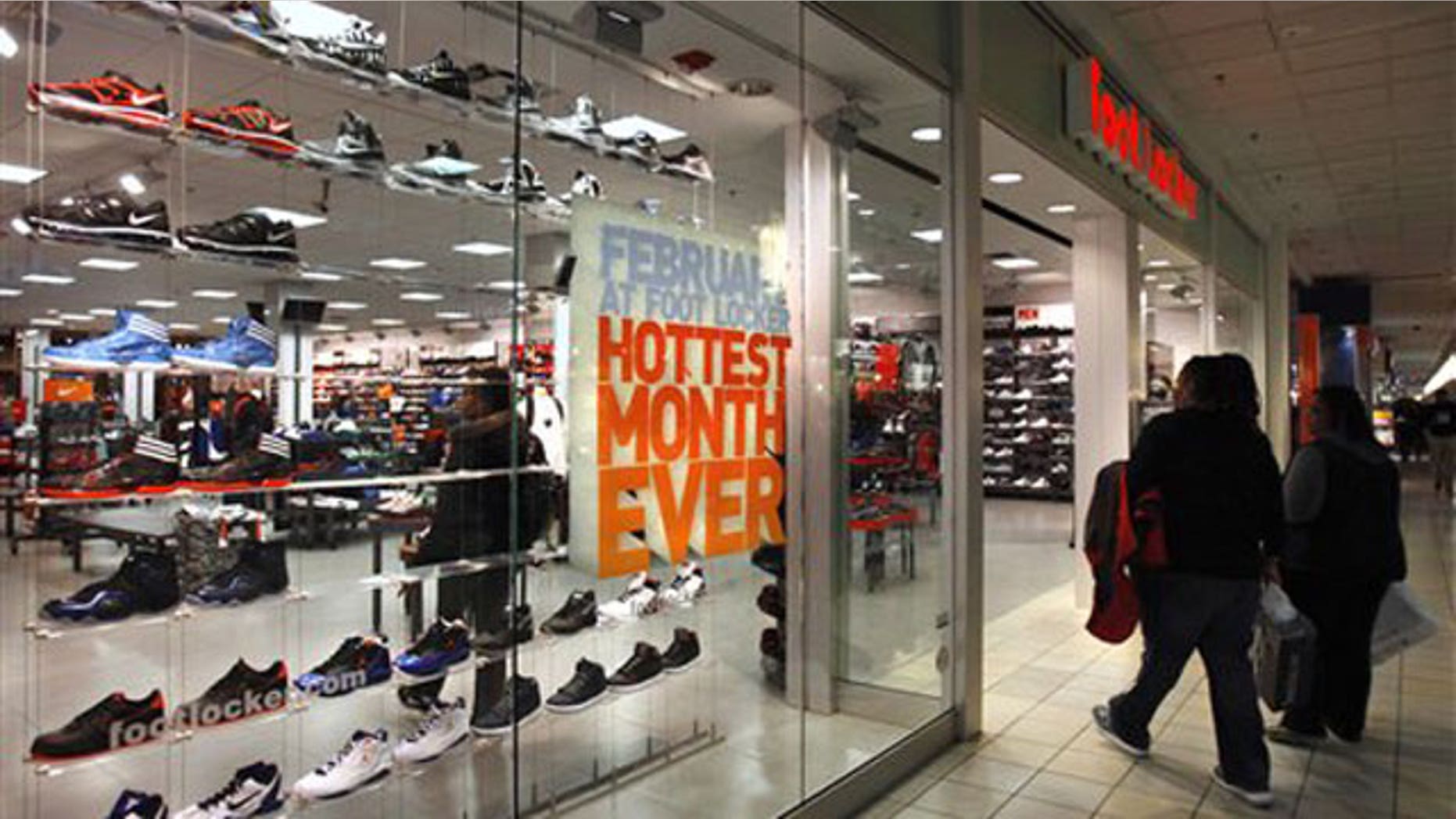 Feb. 24, 2012: Shoppers walk inside Foot Locker at The Mall at Prince George's where crowds had gathered in the early morning hoping for a chance to buy a limited edition Nike sneaker in Hyattsville, Md.
