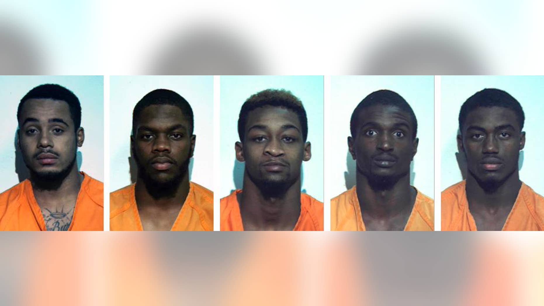 These undated photos provided by the Washington County, Pa. correctional facilty show, from left, Jonathan Barlow, D'Andre Dunkley, Corey Ford, Rodney Gillin Jr. and James Williamson. The five football players from the California University of Pennsylvania, in California, Pa., were arrrested and suspended from the school after police say they beat and stomped a man outside an off-campus restaurant, then fled yelling "Football strong!" The victim was in intensive care Friday, Oct. 31, 2014, with severe brain trauma. (AP Photo/Washington County, Pa. Correctional Facility)