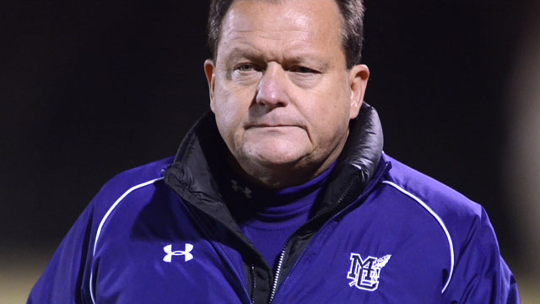 November 15, 2013: Marion County High School head coach Mac McCurry paces the sideline during a playoff football game in Chattanooga, Tenn. McCurry has resigned amid allegations that he and at least two of his assistants painted their team's field house with vulgarities and made it seem like the work of a rival high school. (AP Photo/Chattanooga Times Free Press, Robin Rudd)