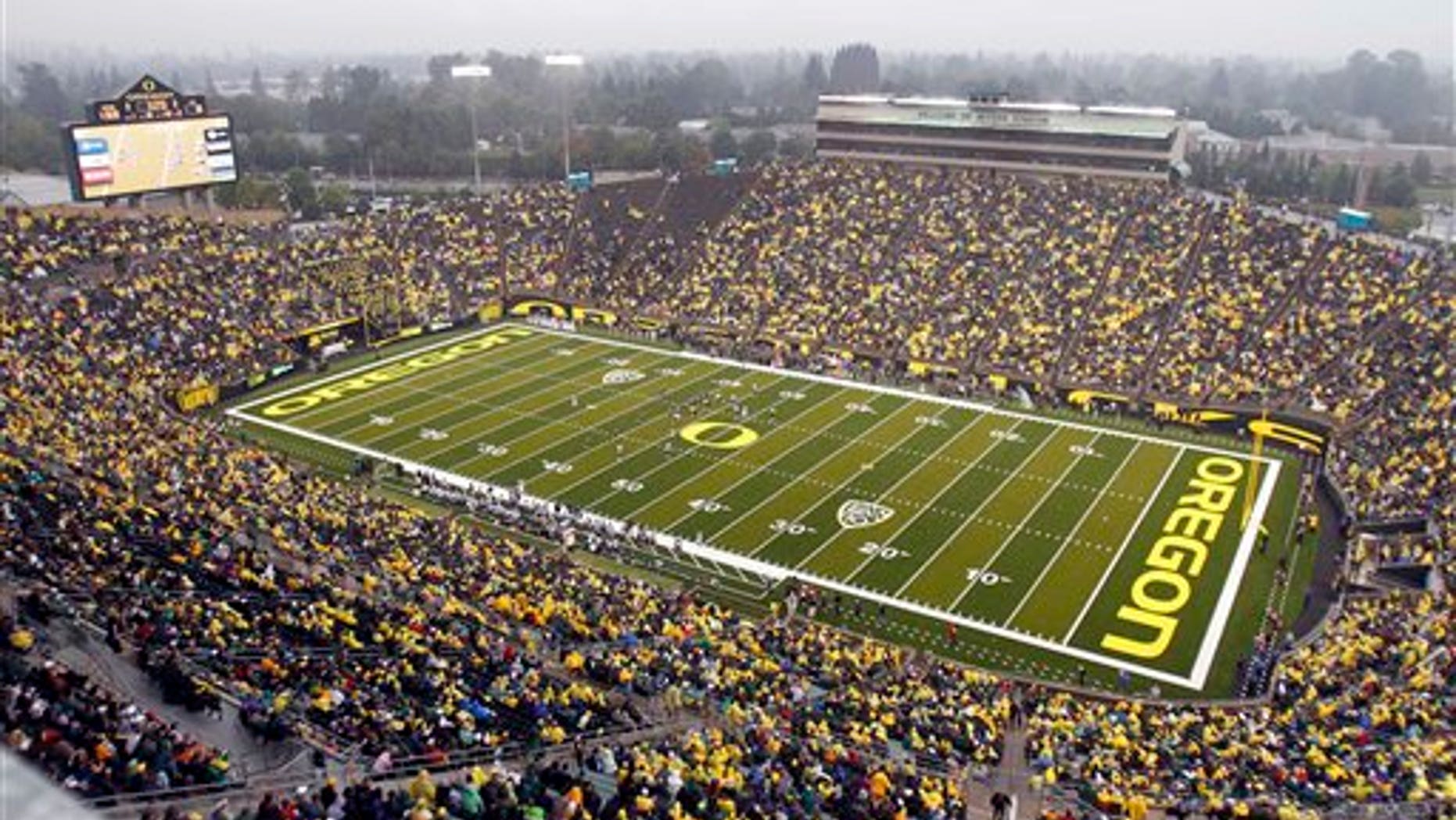 Sept. 18, 2010: This file photo shows spectators in the University of Oregon's Autzen Stadium during the second half of an NCAA college football game between Oregon and Portland State in Eugene, Ore.