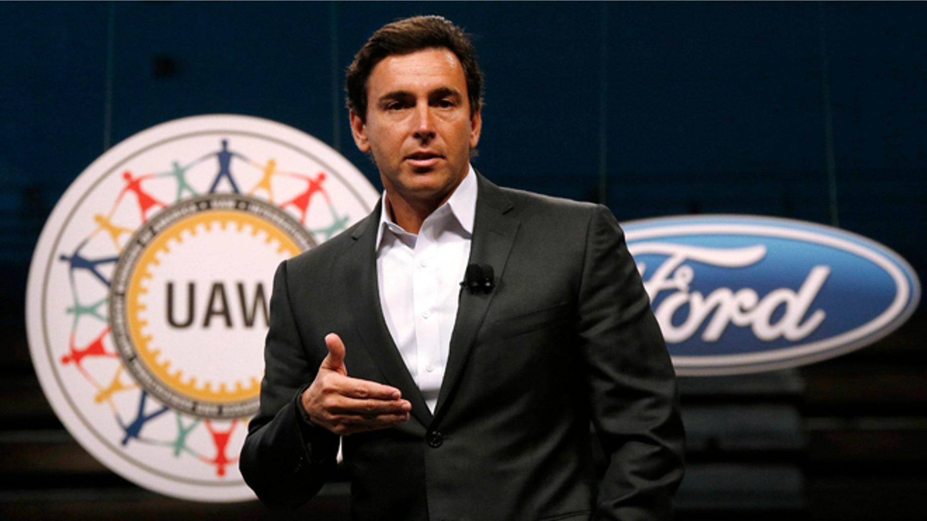 FILE - In this Thursday, July 23, 2015, file photo, Ford Motor Company President and CEO Mark Fields speaks during a ceremony to mark the opening of contract negotiations with the United Auto Workers in Detroit. (AP Photo/Paul Sancya, File)