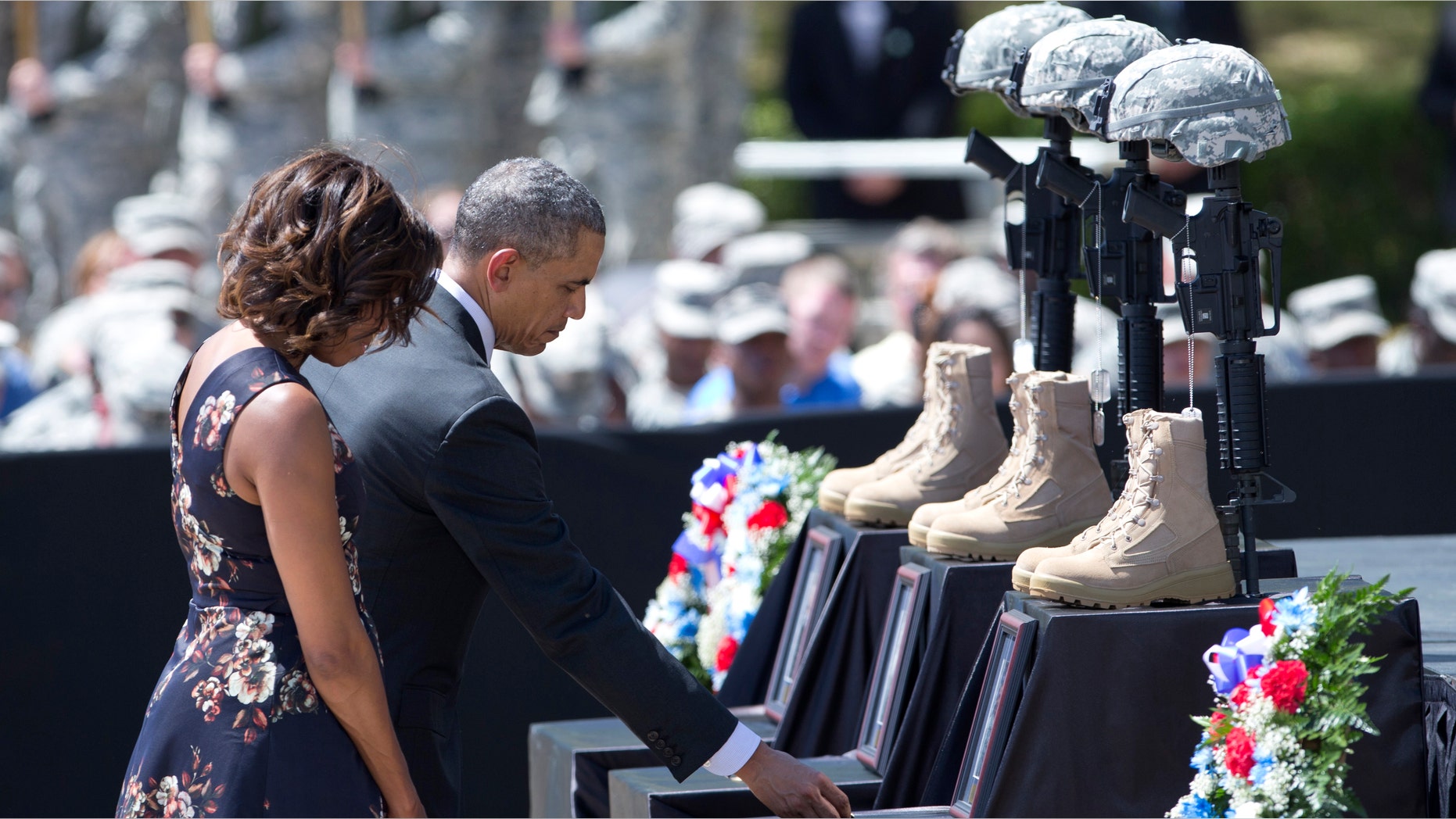 President Obama pays his respect during a memorial ceremony, Wednesday, April 9, 2014, at Fort Hood Texas.
