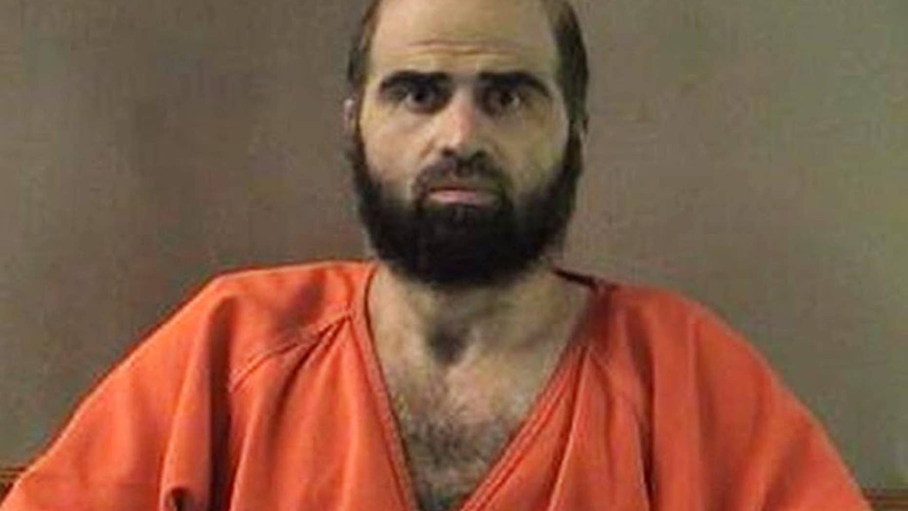 FILE - This undated file photo provided by the Bell County Sheriff's Department shows former Army psychiatrist Maj. Nidal Hasan. Hasan, who killed 13 people in a 2009 shooting spree at a Texas Army base, has a court hearing in his case Thursday, Jan. 29, 2015 at Fort Leavenworth, Kansas, where he is being held on the military death row. (AP Photo/Bell County Sheriff's Department, File)