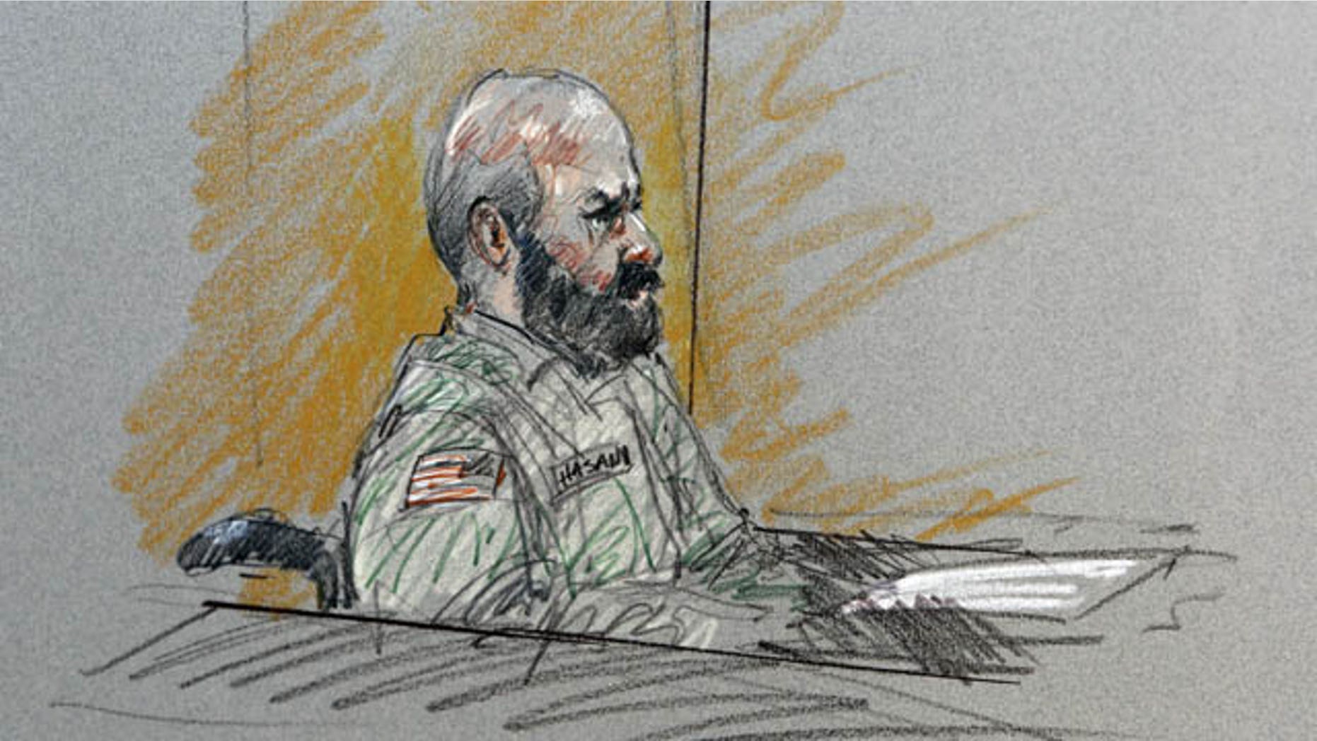 FILE- In this Aug. 6, 2013, file courtroom sketch, Maj. Nidal Malik Hasan sits in court for his court-martial in Fort Hood, Texas. (AP Photo)
