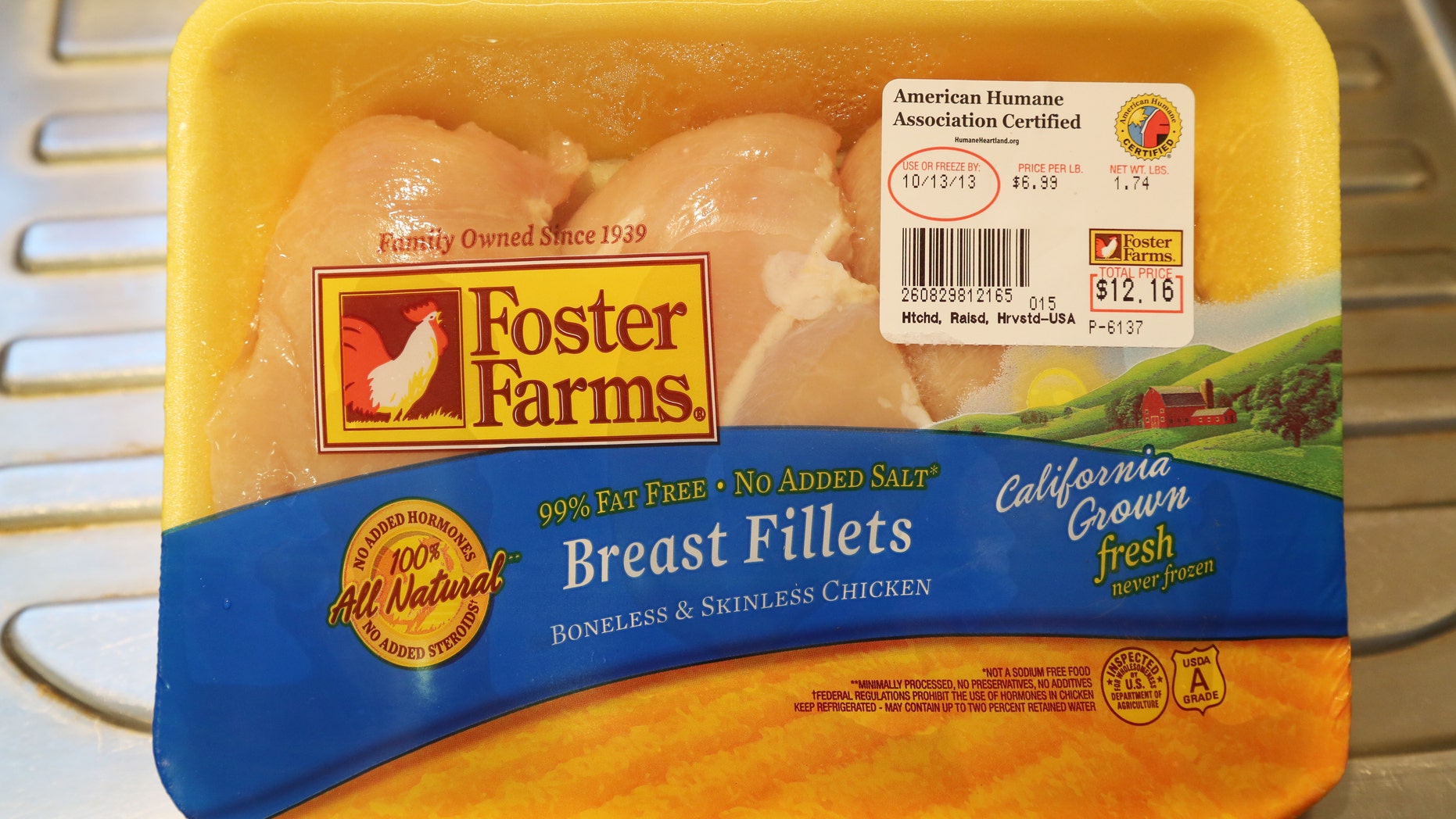 A package of Foster Farms fresh chicken fillets is pictured in this photograph taken in Burbank, California October 11, 2013. (REUTERS/Fred Prouser)