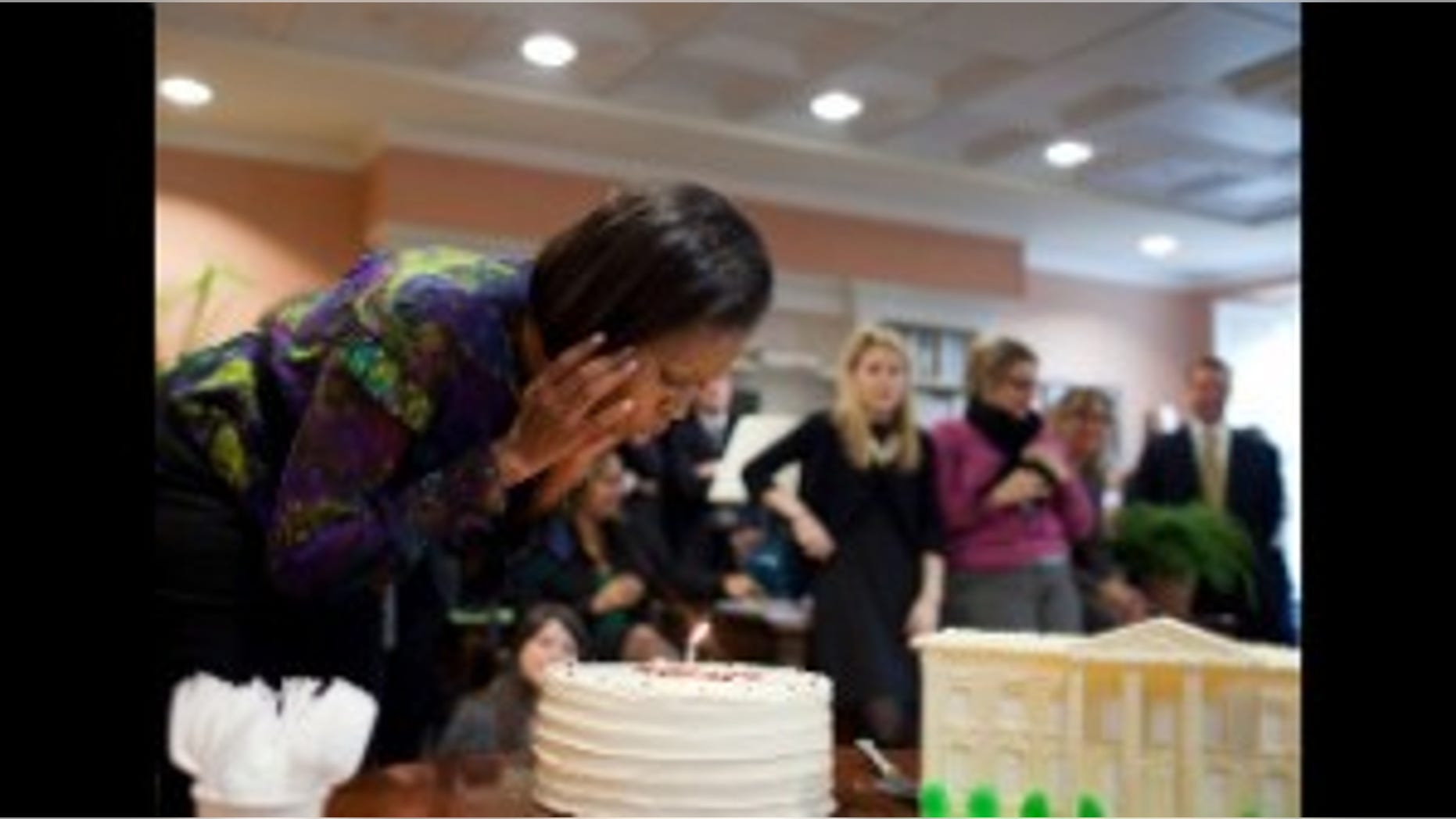 First Lady Michelle Obama has an early birthday celebration with her staff in the East Wing of the White House on Friday, Jan 15, 2010. (WH Photo)