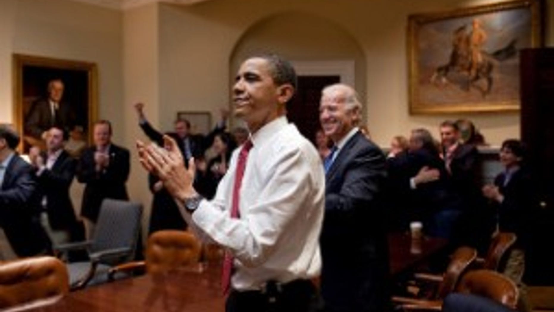 President Obama reacts to the House passing health care reform legislation. (Official White House Photo by Pete Souza)
