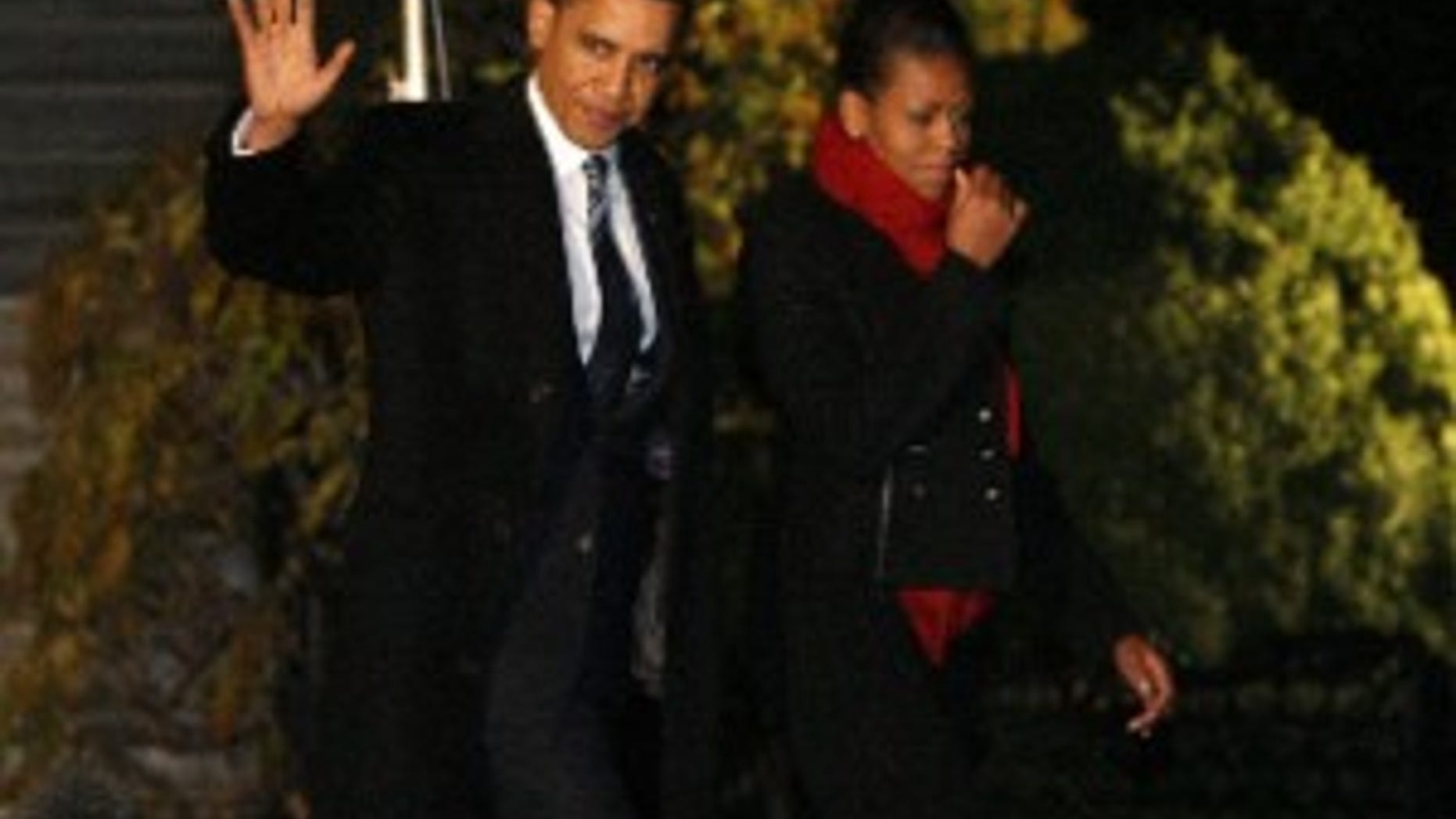 President Barack Obama and first lady Michelle Obama depart the White House in Washington, Wednesday, Dec. 9, 2009, en route to Oslo, Norway, where he will accept the Nobel Peace Prize. (AP Photo/Charles Dharapak)