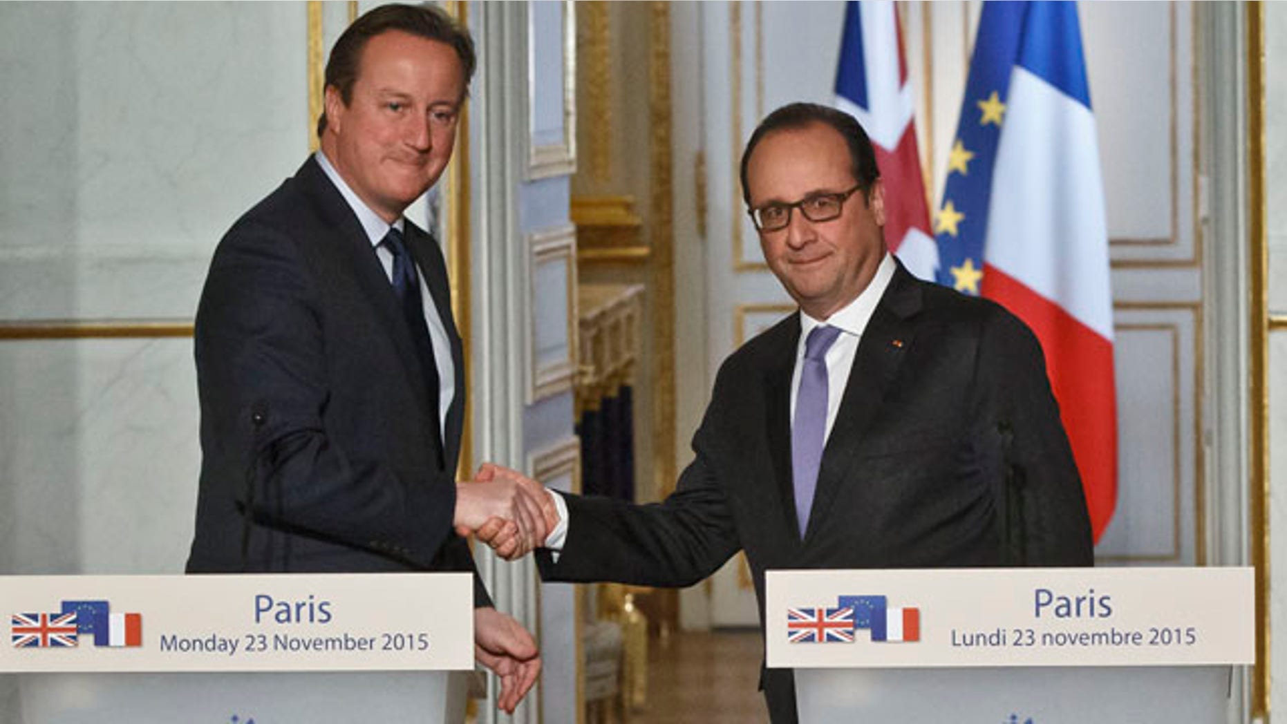 Nov. 23, 2015: Britain's Prime Minister David Cameron, left, and France's President Francois Hollande shake hands after they issued a joint statement to the media at the Elysee Palace in Paris. (AP Photo/Michel Euler)