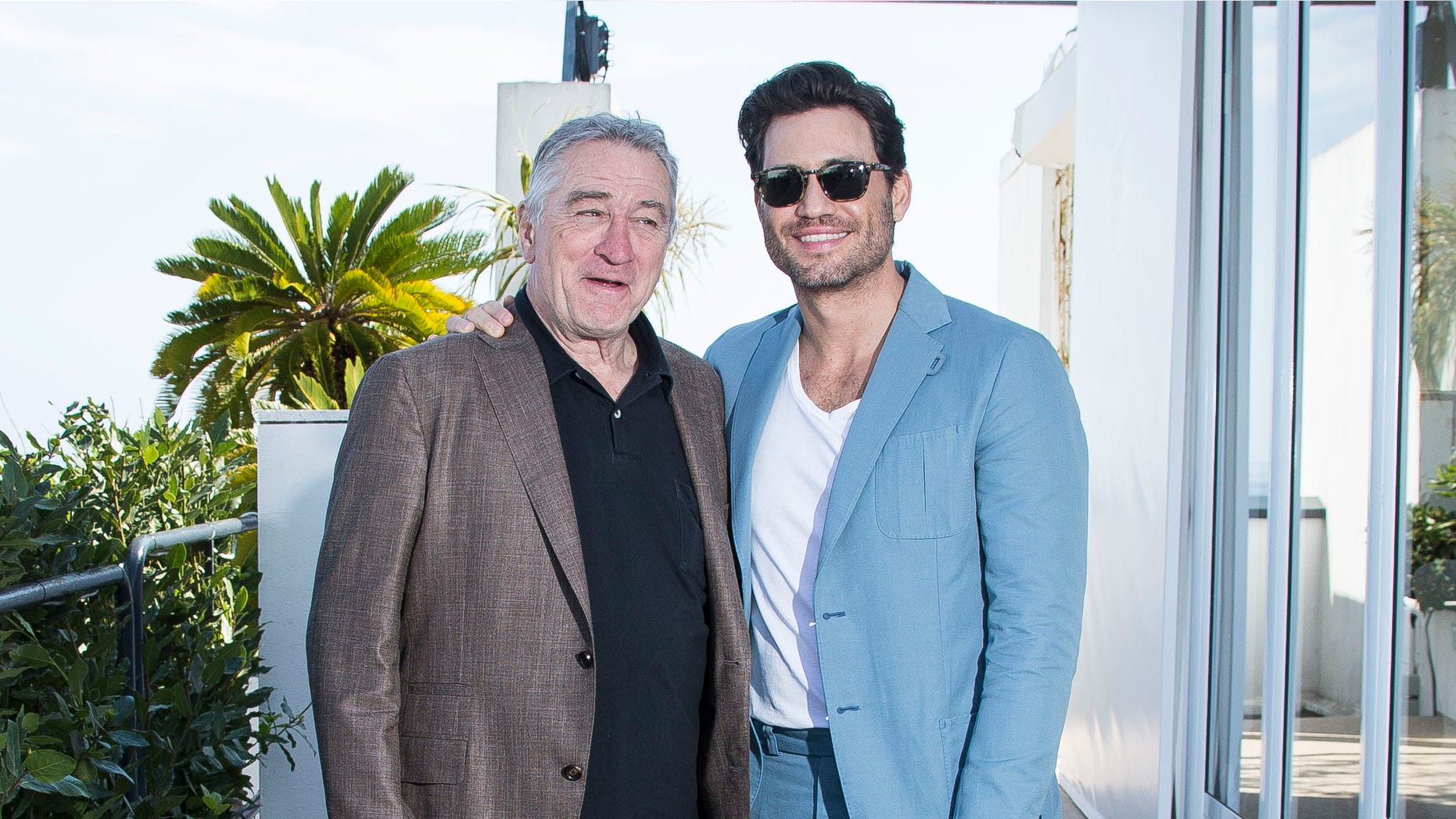 Actors Robert De Niro and Edgar Ramirez pose for portrait photographs for the film Hands of Stone at the 69th international film festival, Cannes, southern France, Tuesday, May 17, 2016. (AP Photo/Joel Ryan)
