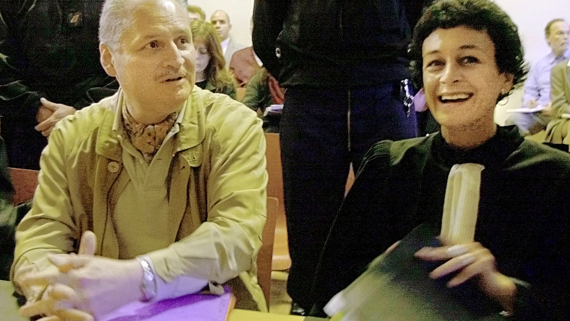 FILE - In this Tuesday, Nov. 28, 2000 file photo, Venezuelan international terrorist Carlos the Jackal whose real name is Ilich Ramirez Sanchez, left, sits with his French lawyer Isabelle Coutant-Peyre in a Paris courtroom.
