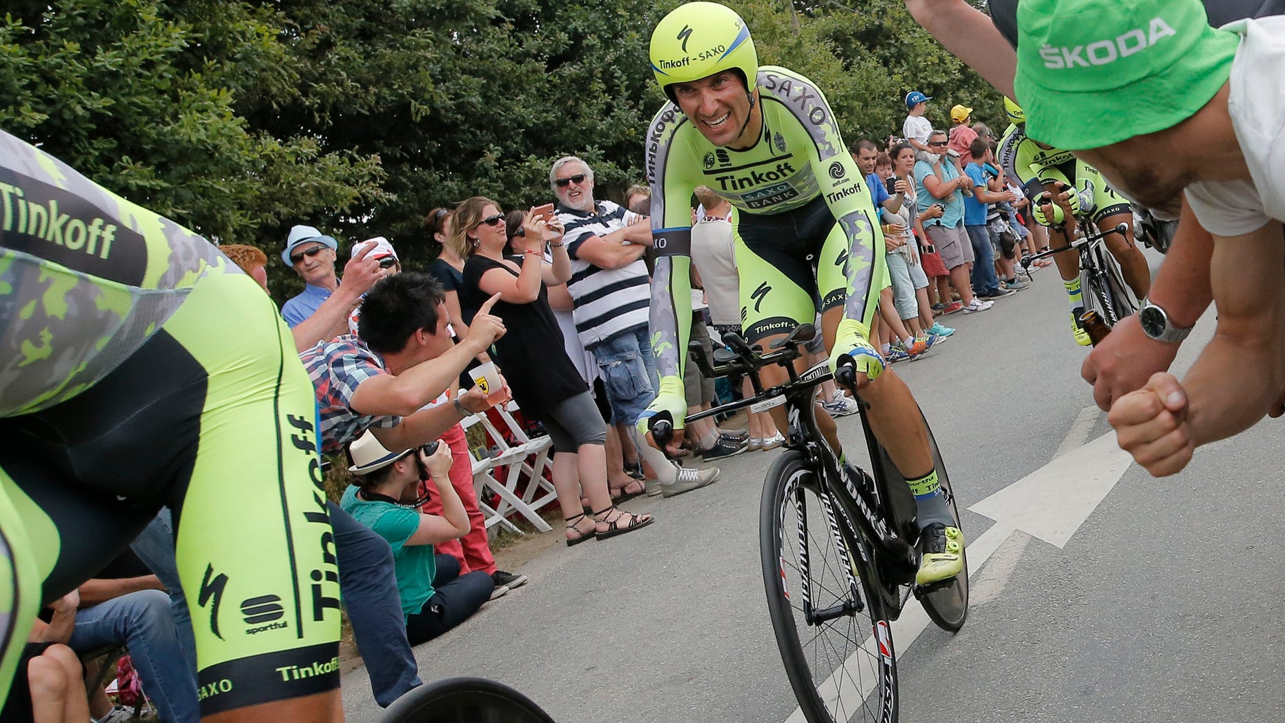 July 12, 2015 - Italy's Ivan Basso, left, trails behind his Tinkoff Saxo team with Spain's Alberto Contador, right, during the ninth stage of the Tour de France cycling race. Basso announced he has cancer in his left testicle and is dropping out of the Tour de France.