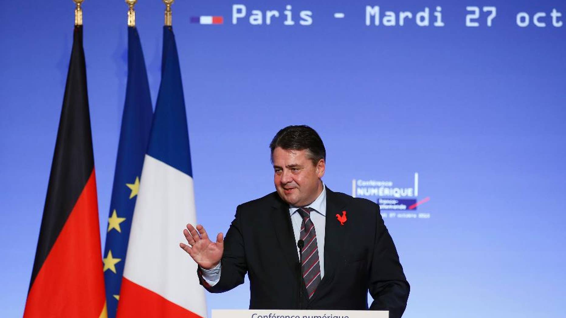 German Vice Chancellor and Economy Minister Sigmar Gabriel delivers his speech during the opening of the France Germany Online Conference at the Elysee Palace in Paris, Tuesday, Oct, 27, 2015. German Chancellor Angela Merkel and French President Francois Hollande meet online entrepreneurs and hold talks on how to making Europe's economy more digital-friendly. (AP Photo/Francois Mori)