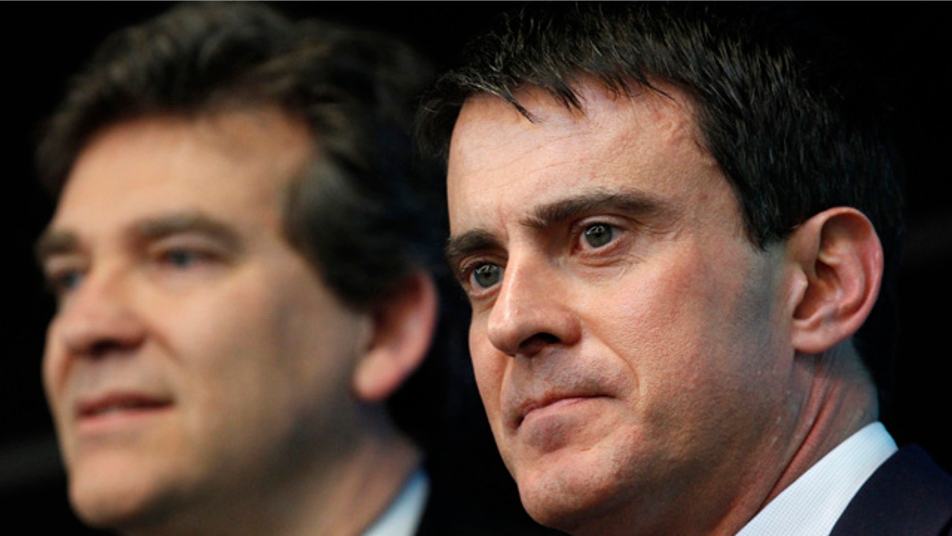 April 10, 2014: This photo shows French prime minister Manuel Valls, right, and Economy Minister Arnaud Montebourg during a visit to French defense and electronic company Thales in Gennevilliers, outside Paris. (AP)