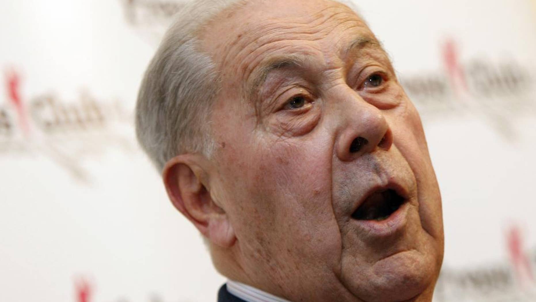 FILE - This Nov. 12, 2009 file picture shows former French Interior Minister Charles Pasqua reacting during a press conference in Paris, France. Charles Pasqua, a French Resistance fighter who went on to become France’s top security chief and a powerful player on the French right, has died at age 88. (AP Photo/Christophe Ena, File)