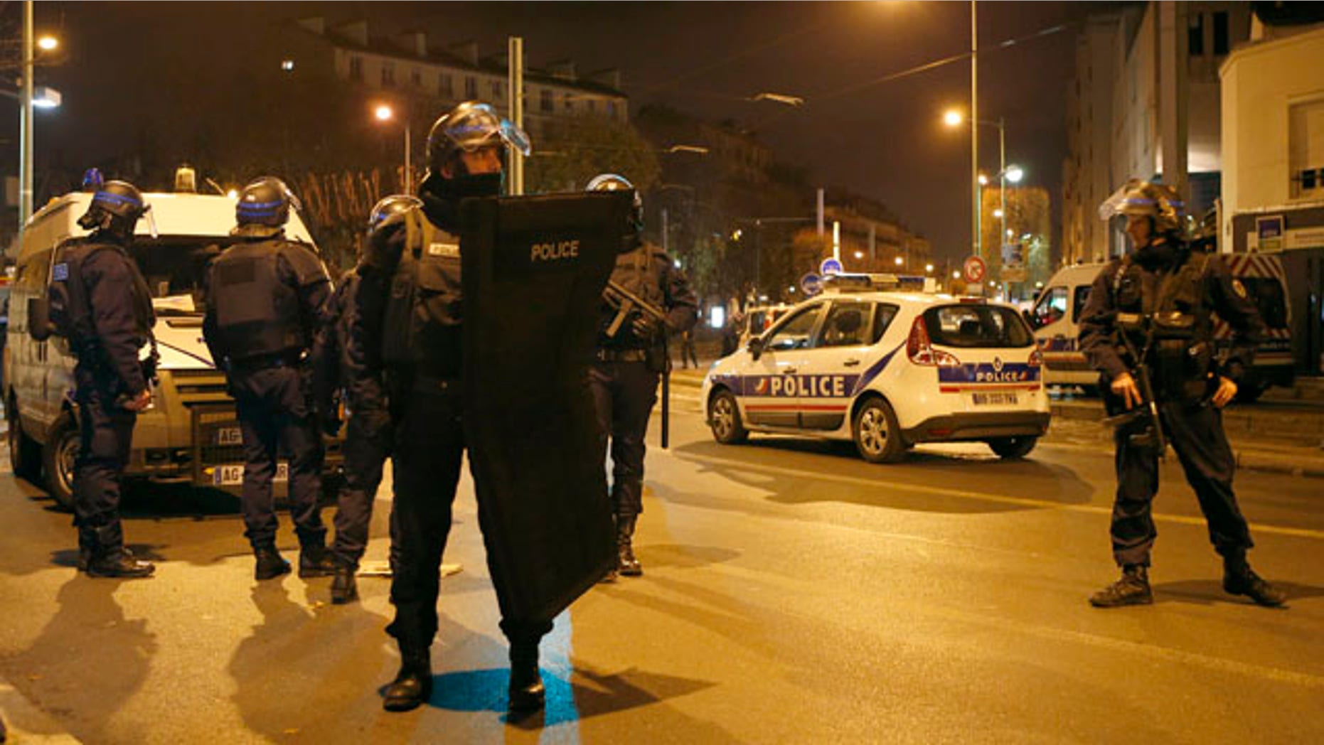 Nov. 18, 2015: Police forces prepare in Paris after reports of a shooting in the northern suburb of St. Denis.(AP Photo/Francois Mori)
