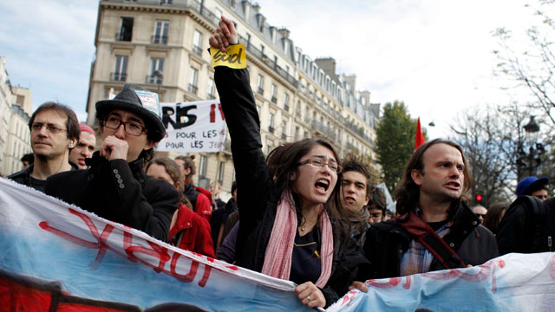 Oct. 26: Students shout slogans during a demonstration in front of the Senate in Paris. Nationwide protests and strikes over government moves to change the retirement age from 60 to 62 have disrupted French life and the country's economy for weeks, but the finance minister has declared that the slowing protest movement has reached a "turning point."