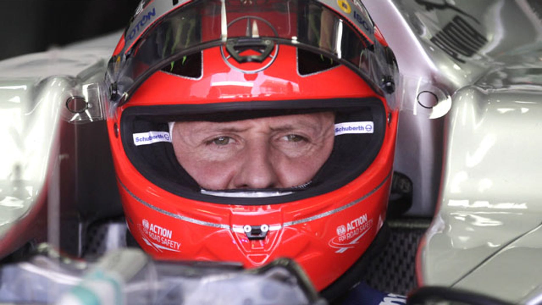 FILE - In this Nov. 23, 2012 file photo, Grand Prix driver Michael Schumacher, of Germany, sits in his car during a free practice at the Interlagos race track in Sao Paulo, Brazil. (AP)