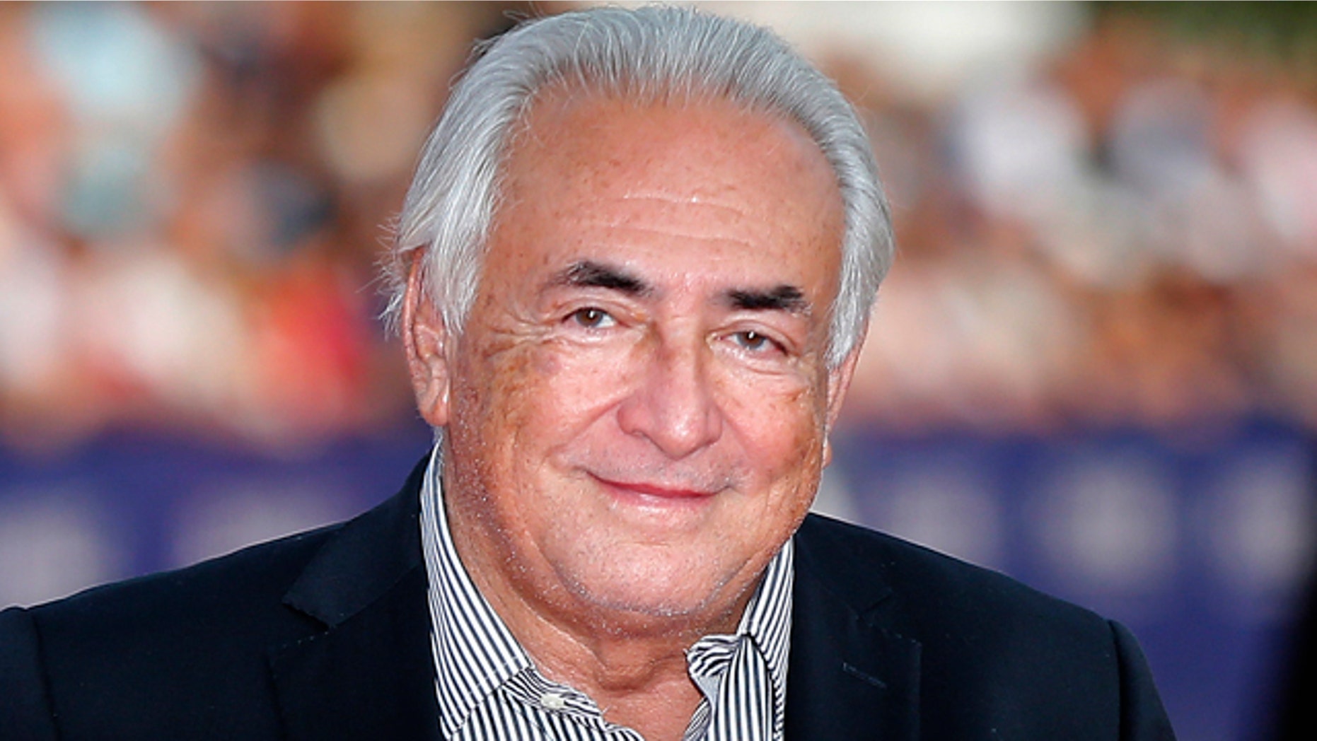 FILE - This Saturday, Sept. 13, 2014, file photo shows former IMF Secretary General Dominique Strauss-Kahn arriving for the award ceremony at the 40th American Film Festival in Deauville, Normandy, western France. (AP Photo/Jacques Brinon, File)