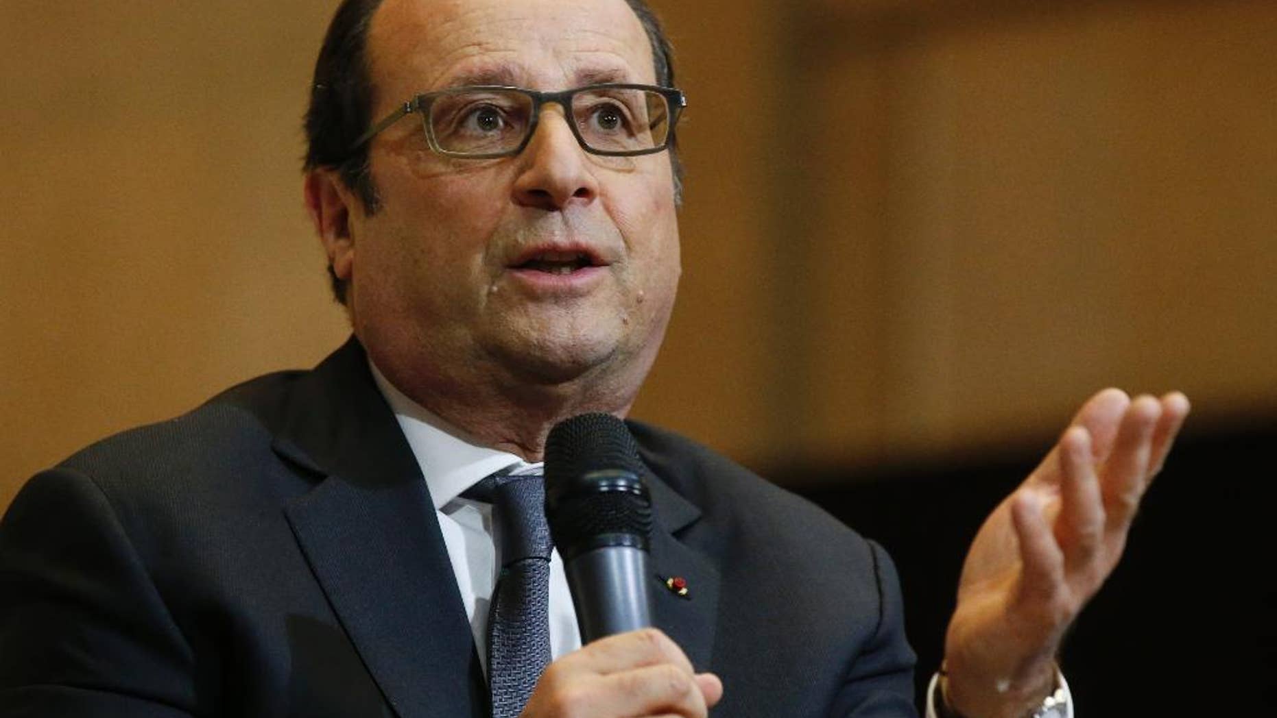 France's President Francois Hollande speaks to students at the economic and social council in Paris, France, Wednesday, May 6, 2015. (AP Photo/Michel Euler, Pool)