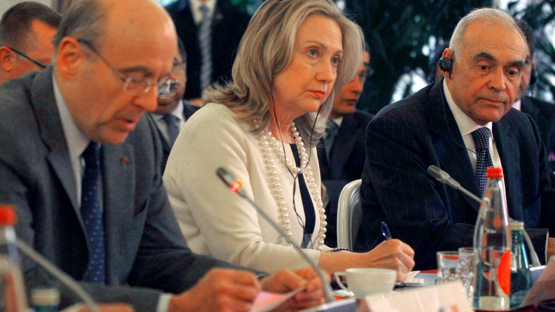 April 19: From left, France's foreign minister Alain Juppe, U.S Foreign Secretary Hillary Rodham Clinton, and Egyptian counterpart, Mohamed Kamel Amr, right, prior to the meeting with a delegation in Pari.