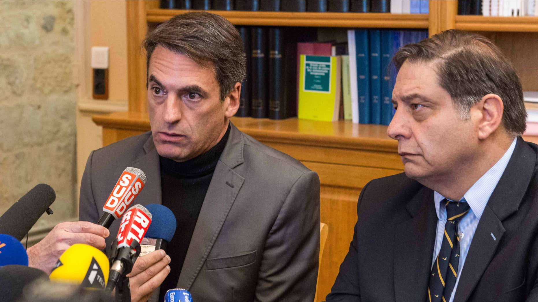 Jan. 20, 2015: Prosecutor Yvon Calvet, right, and a top police official in Montpellier, Gilles Souliers, address the media during a press conference held at the court house in Beziers, southern France.