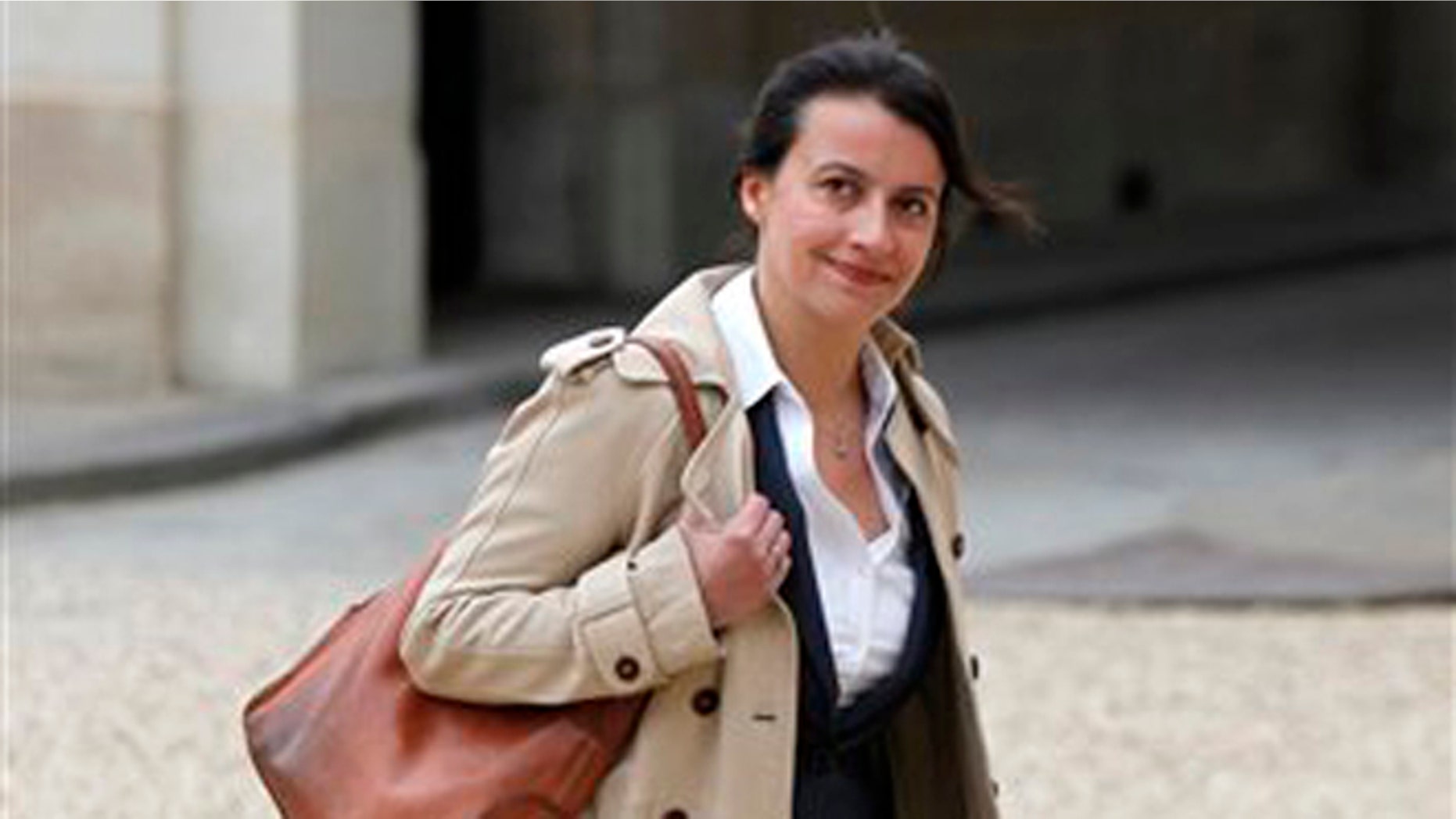 May 17, 2012: In this file photo newly named Housing Minister Cecile Duflot, wearing denim trousers, arrives for the first weekly cabinet meeting with new President Francois Hollande, at the Elysee Palace in Paris.