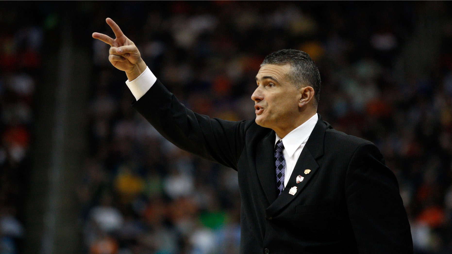 PITTSBURGH, PA - MARCH 15: Head coach Frank Martin of the Kansas State Wildcats reacts against the Southern Miss Golden Eagles during the second round of the 2012 NCAA Men's Basketball Tournament at Consol Energy Center on March 15, 2012 in Pittsburgh, Pennsylvania. (Photo by Jared Wickerham/Getty Images)