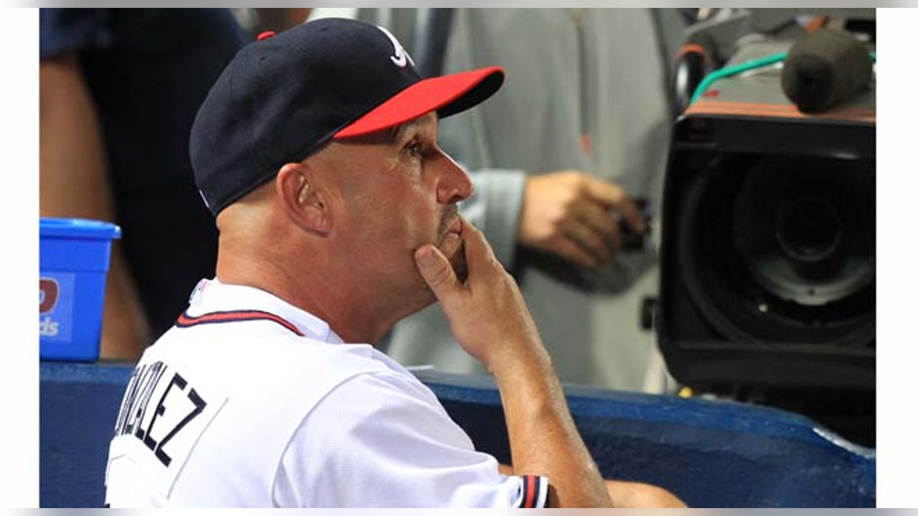 Atlanta Braves manager Fredi Gonzalez watches in the late innings of the team's 4-3 loss to the Philadelphia Phillies in a baseball game at Turner Field in Atlanta on Wednesday, Sept. 28, 2011. (AP Photo/Atlanta Journal-Constitution, Curtis Compton) GWINNETT OUT MARIETTA OUT