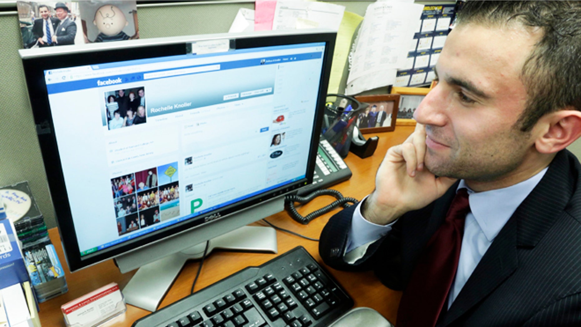 May 9, 2013: Joshua Knoller, an account manager with Nicholas & Lence Communications, looks at the Facebook page of his mother, Rochelle Knoller of Fair Lawn, N.J., on his office computer, in New York. Knoller spent years refusing his mothers "Friend Request" on Facebook before eventually "caving in."