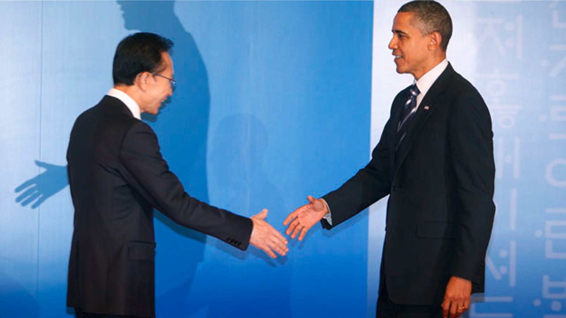 Nov. 11: South Korean President Lee Myung-bak, left, welcomes US President Barack Obama for a reception at the G-20 summit in Seoul, South Korea.