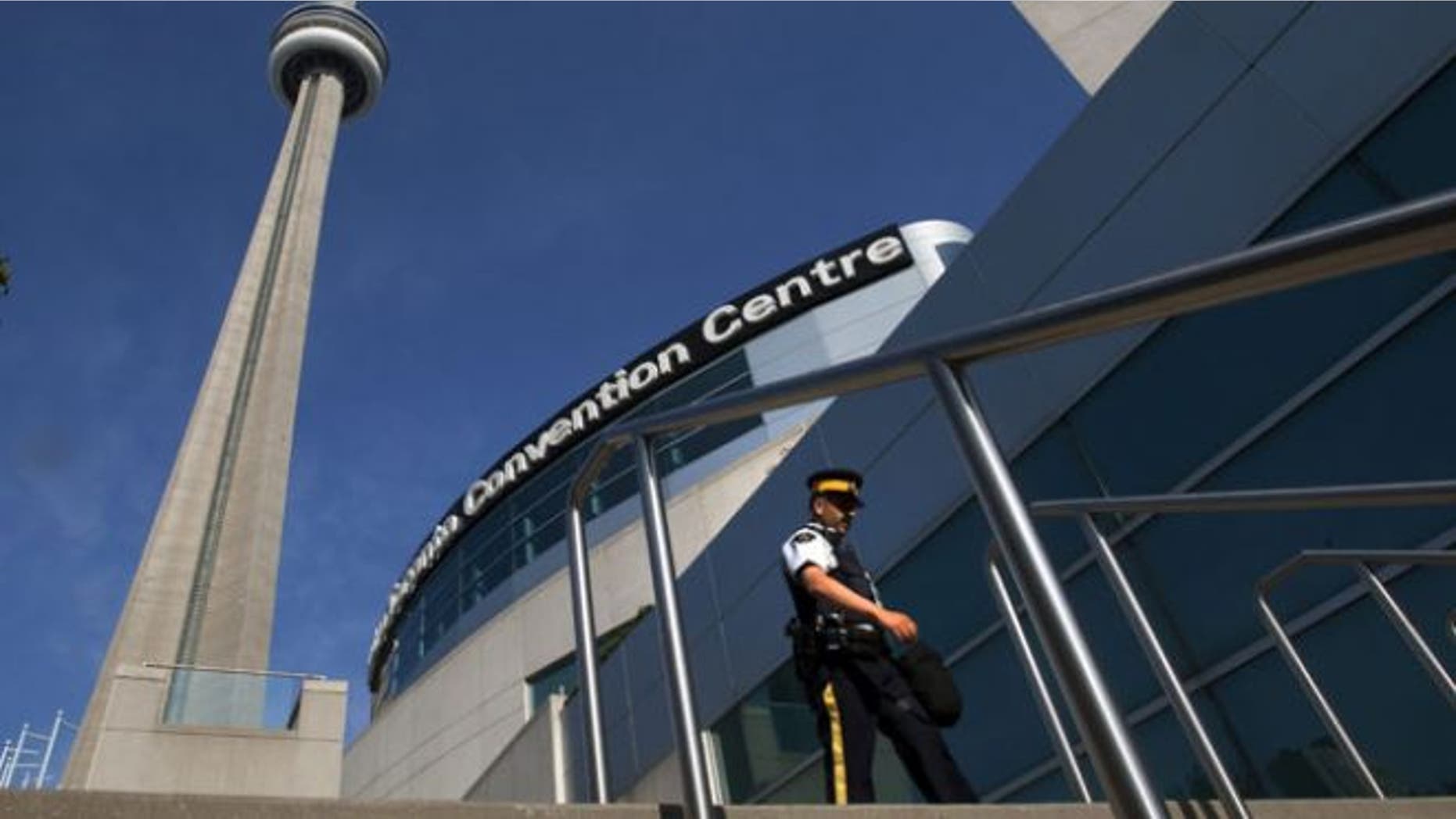 June 25, 2010: A Royal Canadian Mounted Police officer patrols outside the Metro Toronto Convention Center during the G20 summit (AP Photo/The Canadian Press, Frank Gunn)