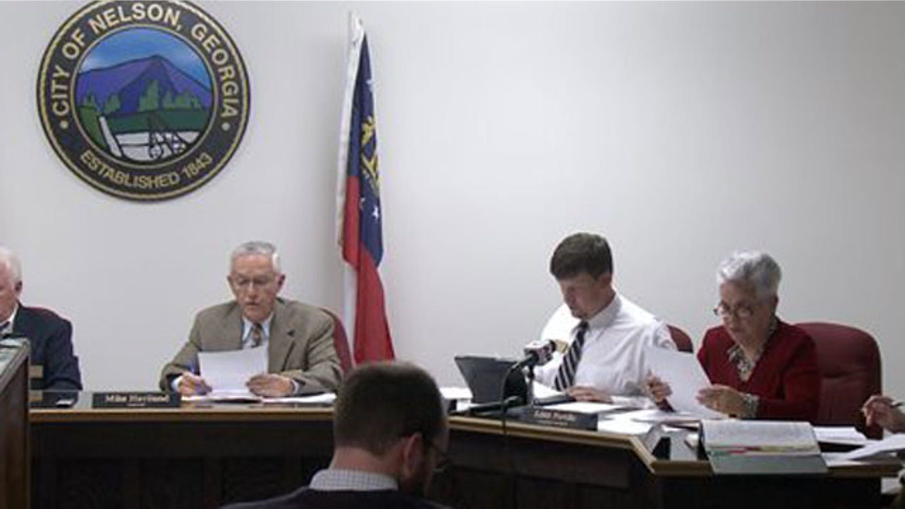 April 1, 2013: The Nelson, Ga. City Council meets to vote on a mandatory gun ownership ordinance for all heads-of-household.