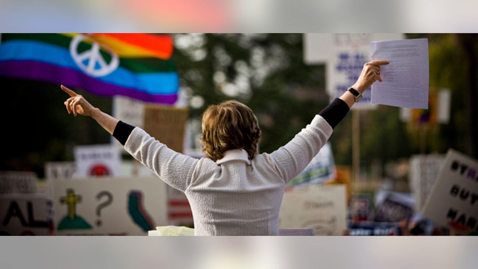 SACRAMENTO, CA - NOVEMBER 22: Attorney Gloria Allred holds up court documents stating that the California Supreme Court has agreed to deliberate on the validity of Proposition 8, during a rally on the steps of the State Capitol November 22, 2008 in Sacramento, California. People across the country continue to protest the passing of California State Proposition 8 which makes gay marriage in California illegal. (Photo by Max Whittaker/Getty Images)