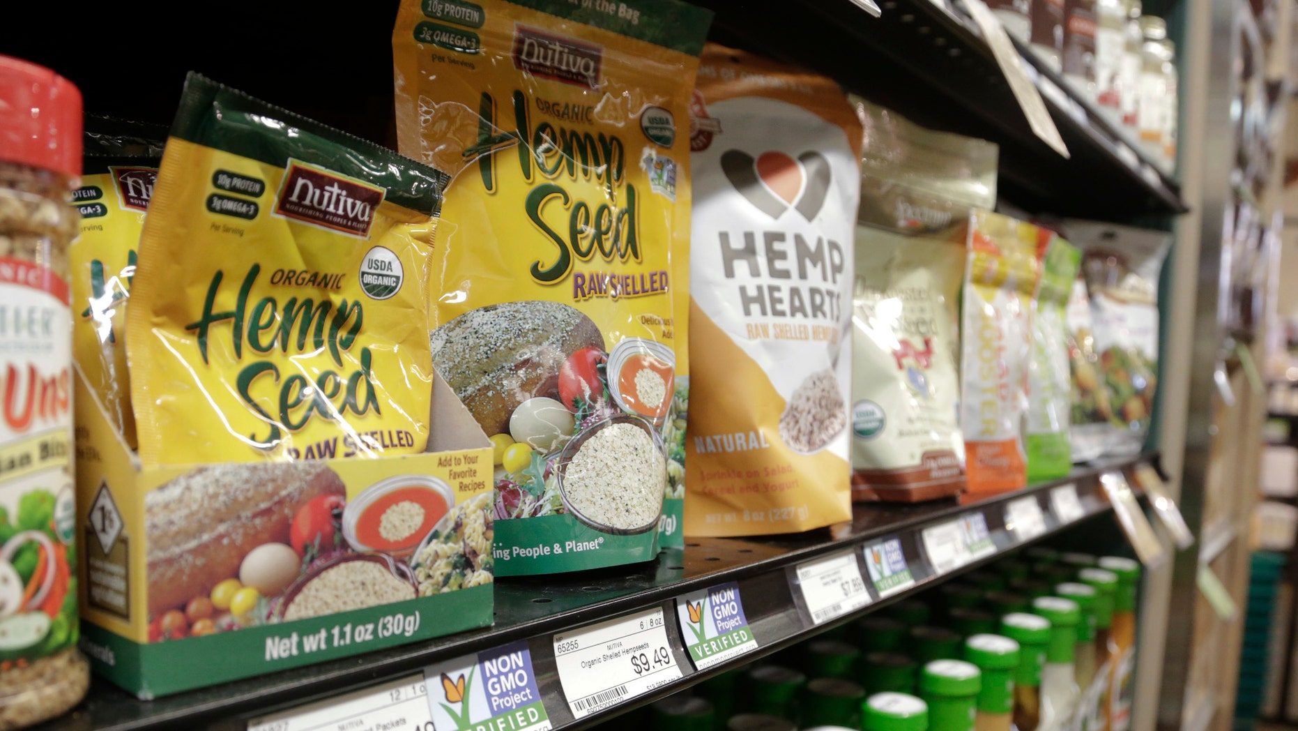 Labels point out products verified to not contain genetically modified organisms (GMO) at the Central Co-op in Seattle, Washington October 29, 2013. (REUTERS/Jason Redmond)