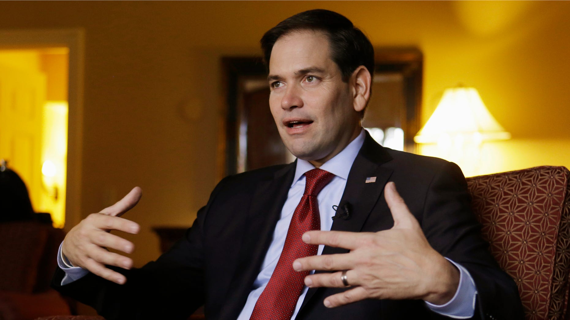 Republican presidential candidate Sen. Marco Rubio, R- Fla., speaks during an interview with the Associated Press in Orlando, Fla., Friday, Nov. 13, 2015. As Rubio campaigns for the Republican presidential nomination, heâs pledging to bring generational change to Washington. Yet Rubioâs policy toward Cuba looks like a step into the past. As president, he says, heâd reinstate a half-century-old diplomatic freeze that failed to unseat the communist government on the island where his parents were born. (AP Photo/John Raoux)