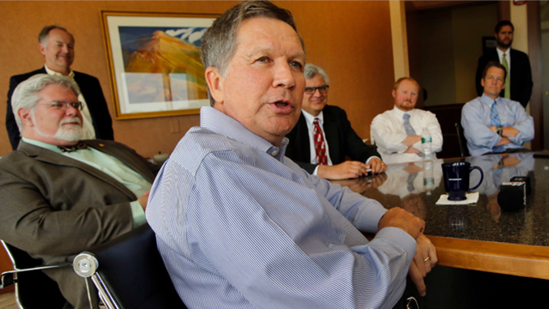 June 5, 2015: Ohio Gov. John Kasich speaks during a luncheon meeting with area business leaders in Concord, N.H. (AP Photo/Jim Cole)