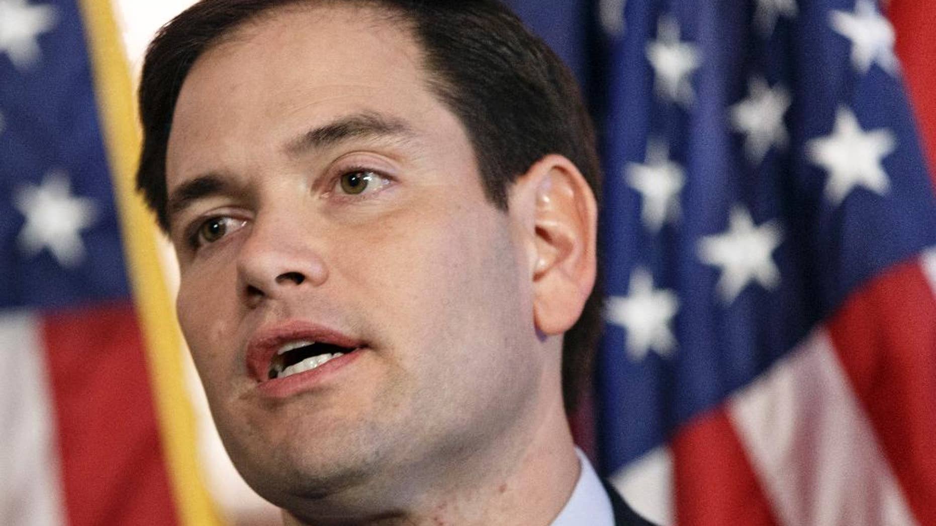 FILE - In this Jan. 8, 2014 file photo, Sen. Marco Rubio, R-Fla. speaks on Capitol Hill in Washington. Rubio is positioning himself as the leading foreign policy hawk among Republicans considering runs for the White House, pushing for more military spending and greater intervention abroad as the United States confronts Islamic State extremists in Iraq and Syria. (AP Photo/J. Scott Applewhite, File)