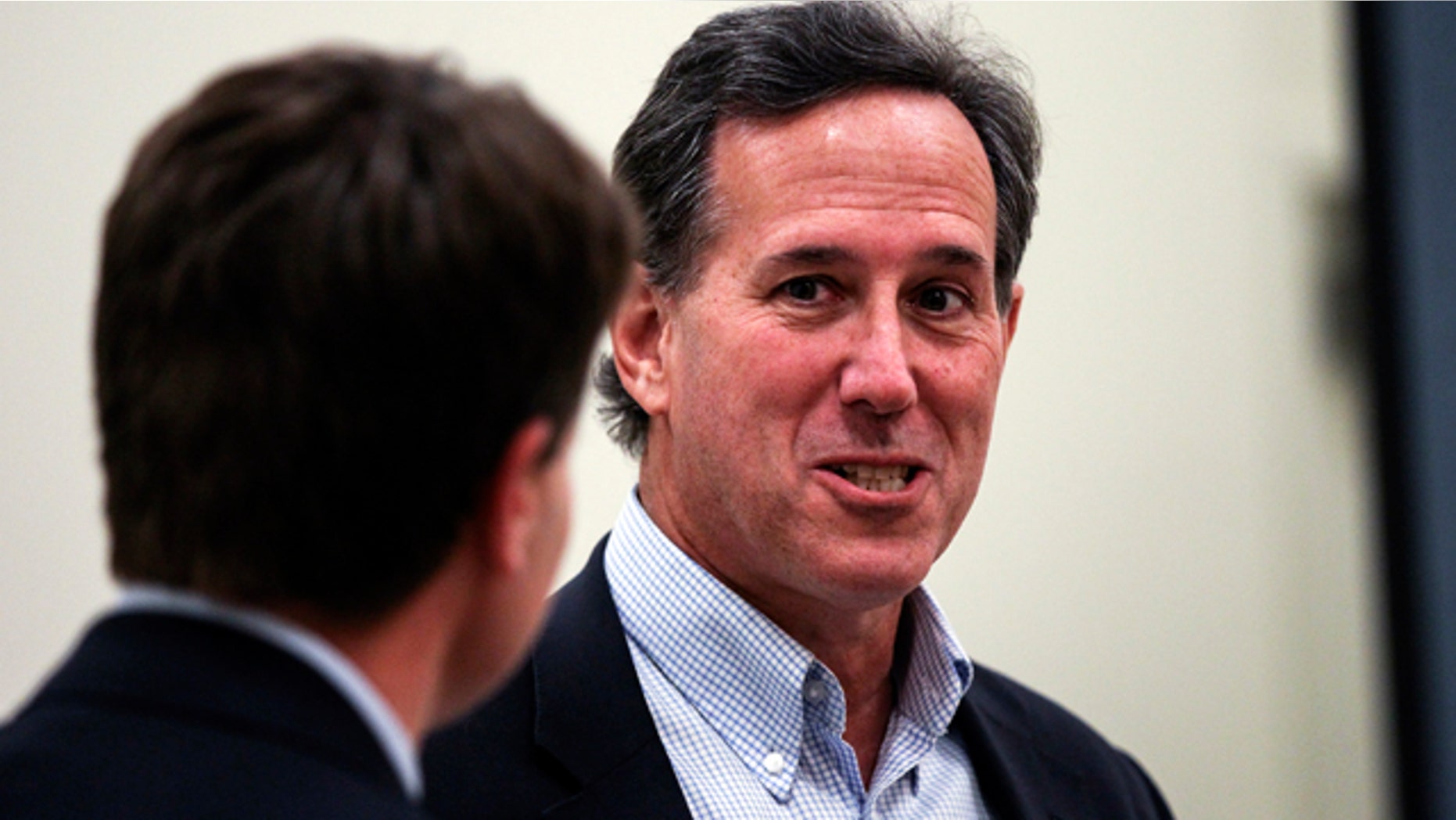 Oct. 3, 2015: Republican presidential candidate former Sen. Rick Santorum, R-Pa., prepares to speak during the Practical Federalism Forum hosted by American Principles Project held at Southern New Hampshire University in Hooksett, N.H. (AP Photo/Cheryl Senter)