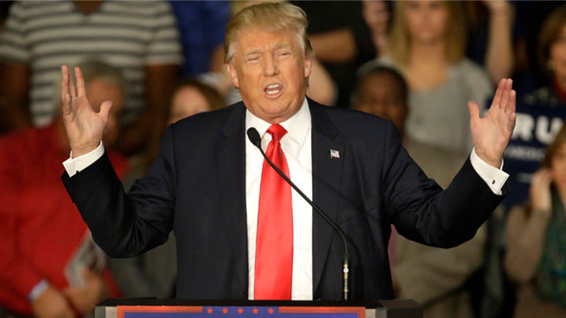 Nov. 9, 2015: Republican presidential candidate Donald Trump speaks to a crowd of supporters during a campaign rally in Springfield, Ill. (AP Photo/Seth Perlman)
