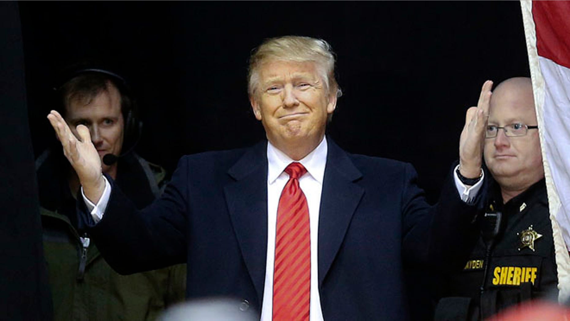 FILE -- Republican presidential candidate Donald Trump reacts as he steps on stage for a rally at Clemson University Wednesday, Feb. 10, 2016, in Pendleton, S.C.