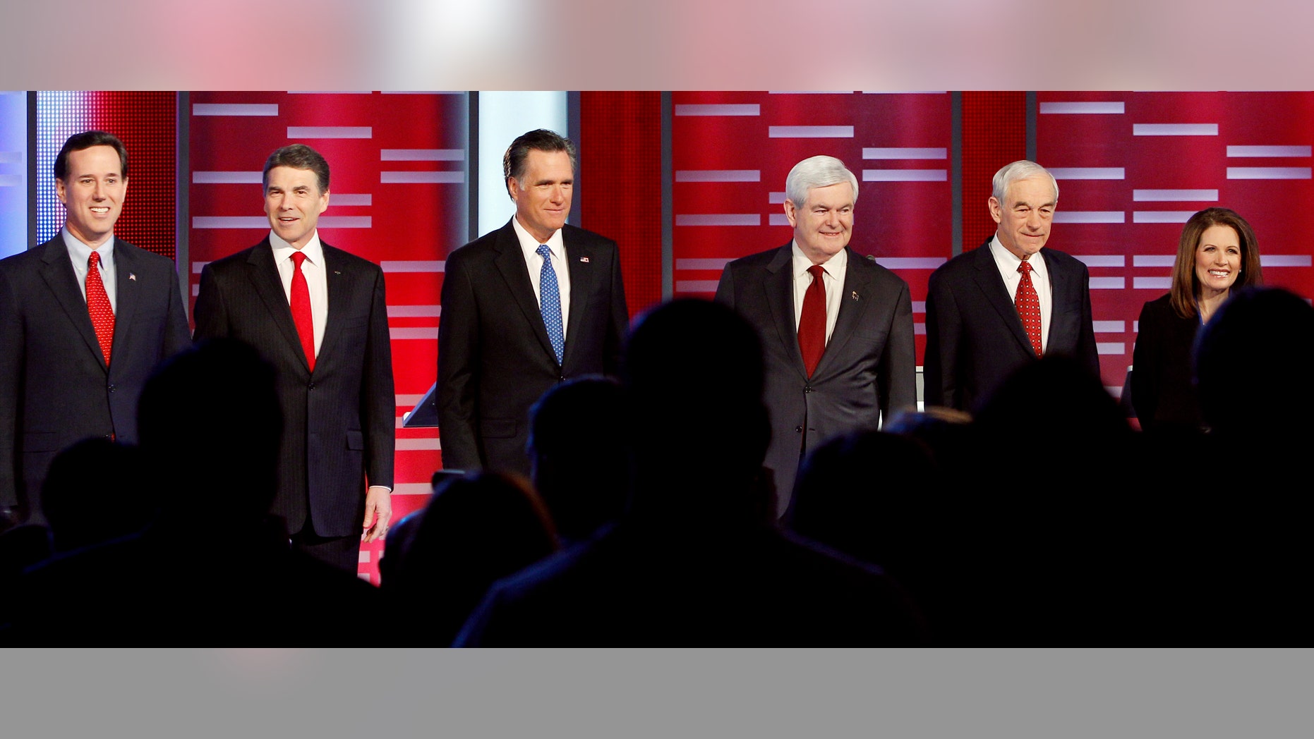 Former Pennsylvania Sen. Rick Santorum, Texas Gov. Rick Perry, former Massachusetts Gov. Mitt Romney, former Speaker of the House Newt Gingrich, Rep. Ron Paul, R-Texas, and Rep. Michele Bachmann, R-Minn, prior to their Republican debate, Saturday, Dec. 10, 2011, in Des Moines, Iowa.