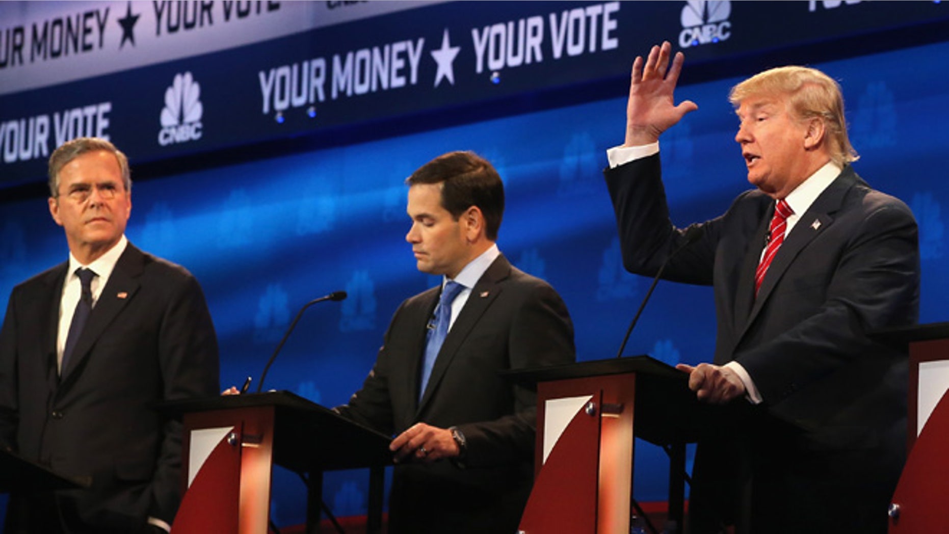 Presidential candidates Donald Trump speaks while Sen. Marco Rubio (R-FL) and Jeb Bush look on during the CNBC Republican Presidential Debate at University of Colorado's Coors Events Center October 28, 2015 in Boulder, Colorado. (Photo by Justin Sullivan/Getty Images)