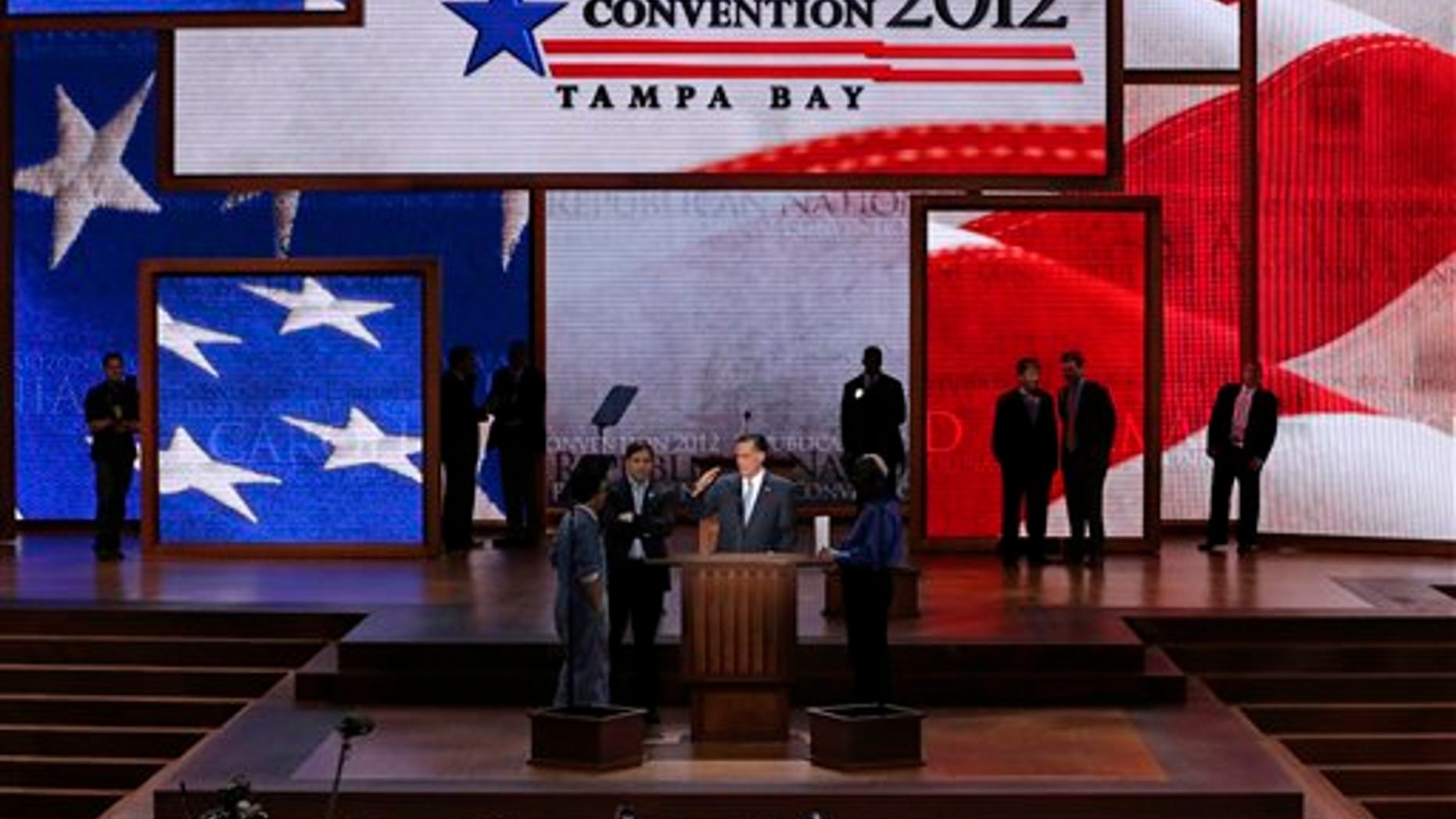 Republican presidential nominee Mitt Romney looks over his speaking position during at sound check at the Republican National Convention in Tampa, Fla., on Thursday, Aug. 30, 2012. (AP Photo/J. Scott Applewhite)