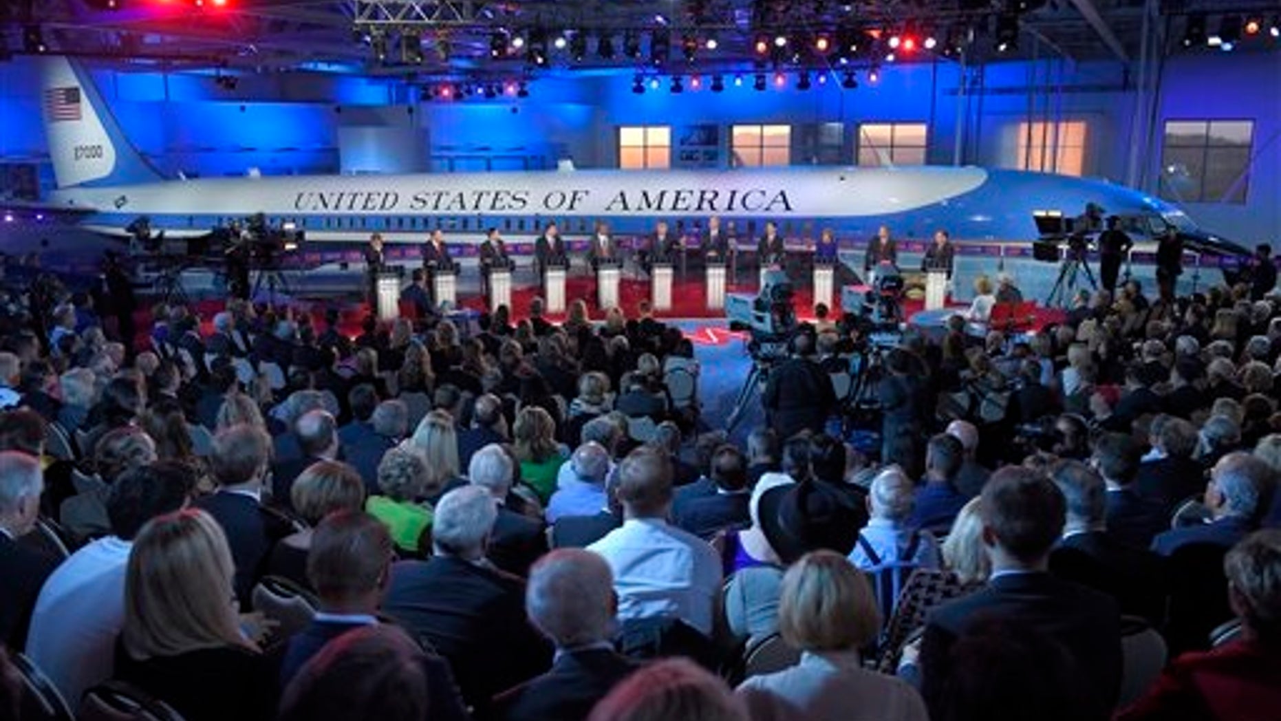 The candidates stand behind their podiums during the CNN Republican presidential debate at the Ronald Reagan Presidential Library and Museum on Wednesday, Sept. 16, 2015, in Simi Valley, Calif. (AP Photo/Mark J. Terrill)