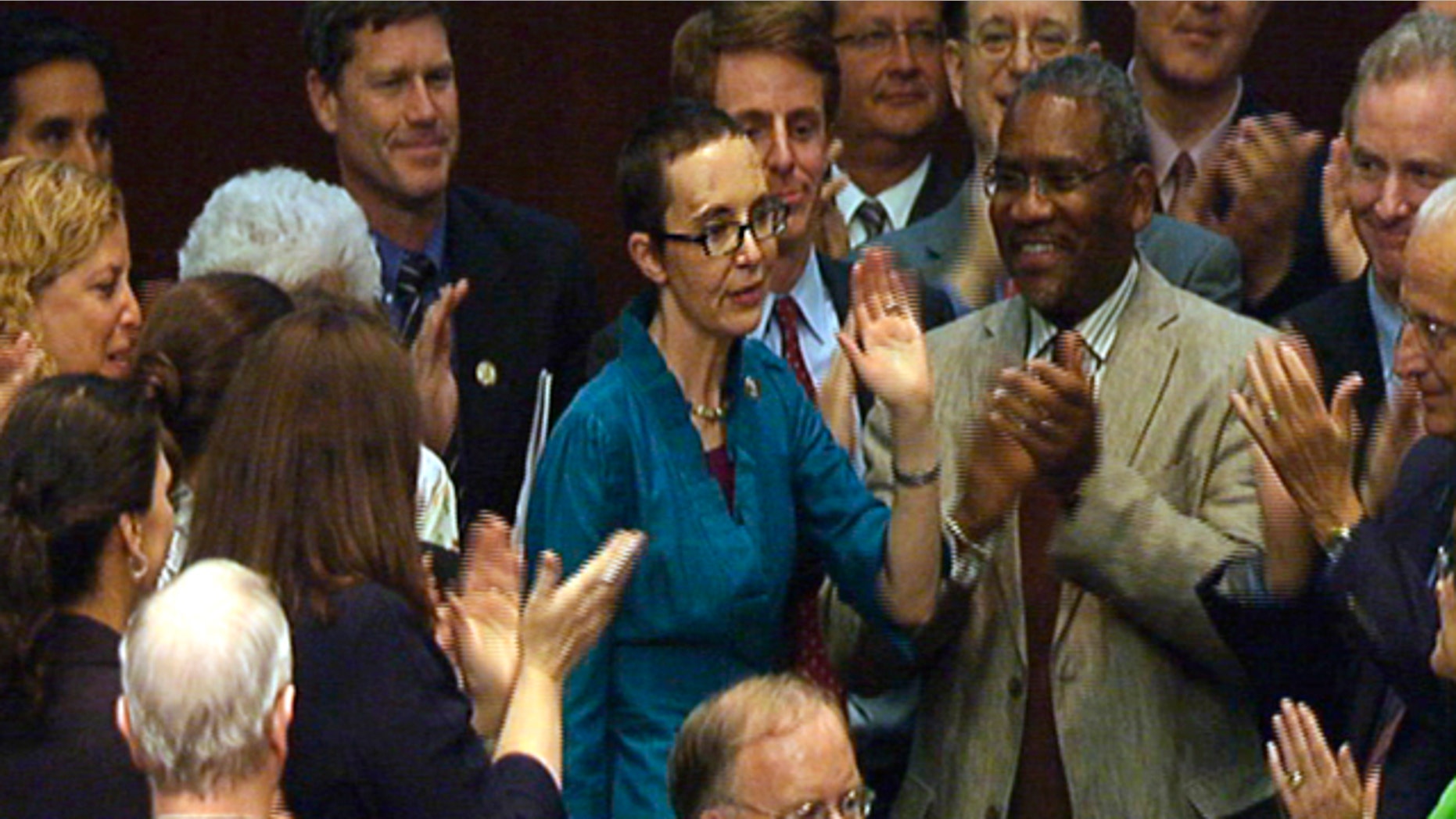 Aug. 1, 2011: In this image from House TV, Rep. Gabrielle Giffords, D-Ariz., appears on the floor of the House for a vote on the plan to raise the federal debt limit.