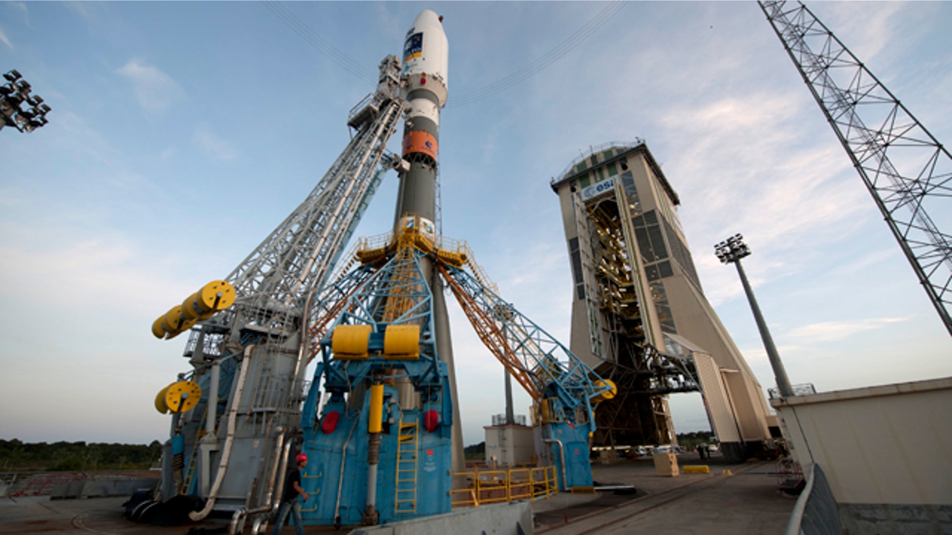 Oct. 14, 2011: Soyuz VS01, the first Soyuz flight from Europes Spaceport in French Guiana, sits on the launchpad awaiting the green light to lift off.The vehicle was rolled out horizontally on its erector from the preparation building to the launch zone and then raised into the vertical position. The Upper Composite, comprising the Fregat upper stage, payload and fairing, was also transferred and added onto the vehicle from above, completing the very first Soyuz on its launch pad at Europes Spaceport.Soyuz VS01 will lift off on 20 October 2011. The rocket will carry the first two satellites of Europes Galileo navigation system into orbit.