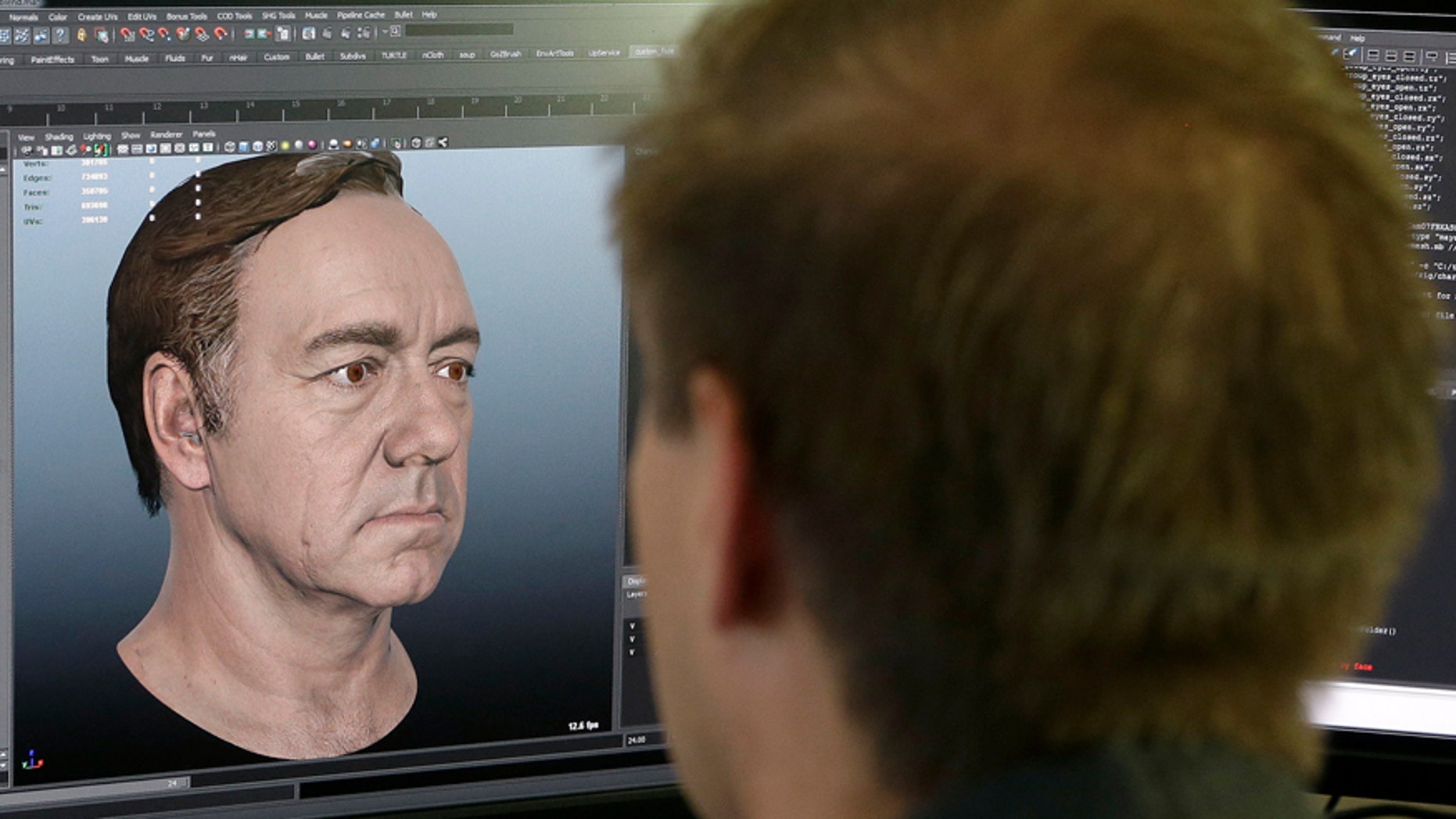 This July 31, 2014 photo shows senior technical artist Mason Sheffield working on the face of actor Kevin Spacey for the new "Call of Duty: Advanced Warfare" game at Sledgehammer Games in Foster City, Calif.