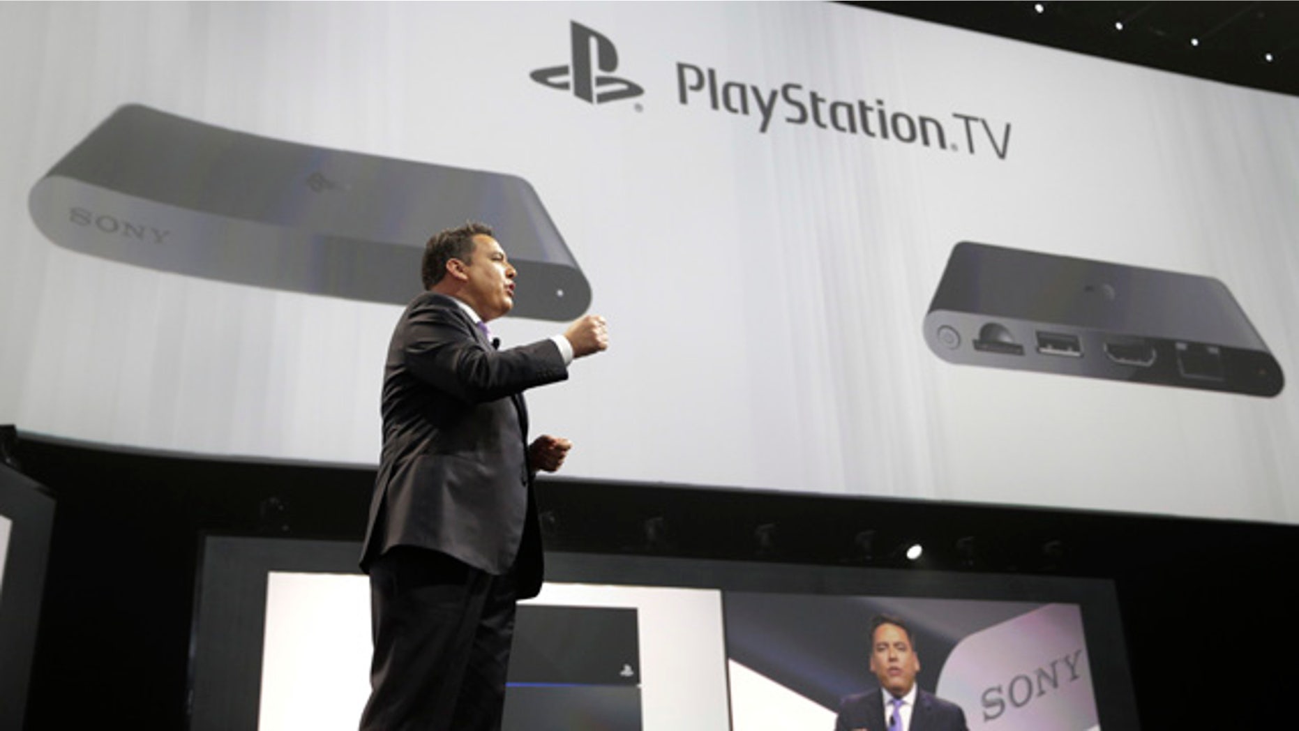 June 9, 2014: Shawn Layden, president and CEO of Sony Computer Entertainment America, introduces the PlayStation TV during a presentation at the Electronic Entertainment Expo in Los Angeles. (AP Photo/Jae C. Hong)