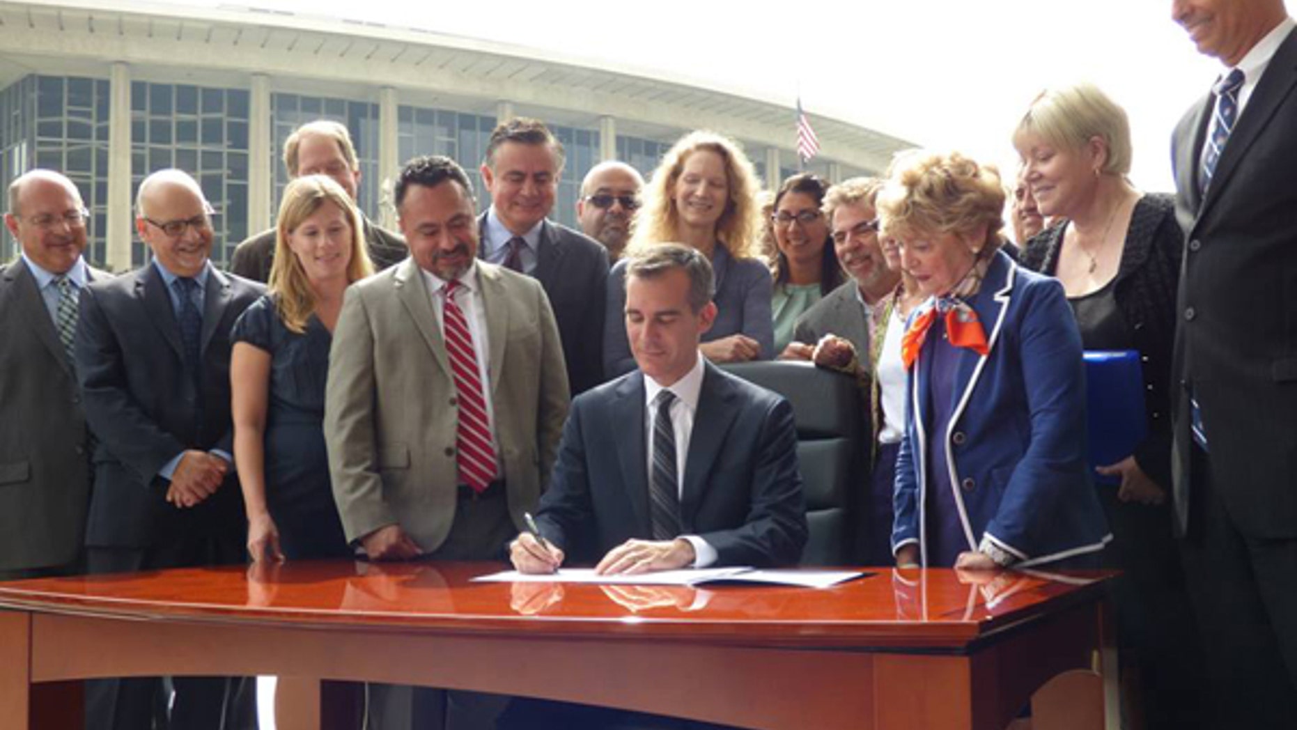 Led by Los Angeles Mayor Eric Garcetti (center) the Mayors National Climate Action Agenda recently declared that they will not enforce President Trumps recent rollback of federal climate policy.